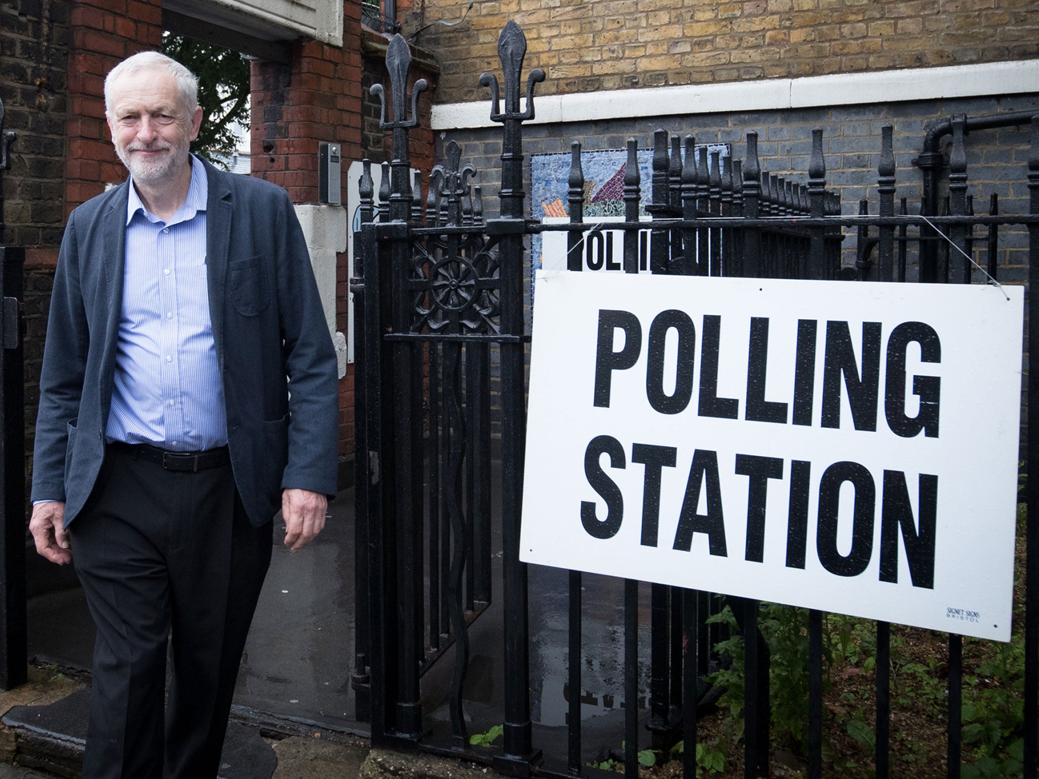 Labour Party leader Jeremy Corbyn leaves after casting his vote at a polling station at Pakeman Primary School in Islington on June 23