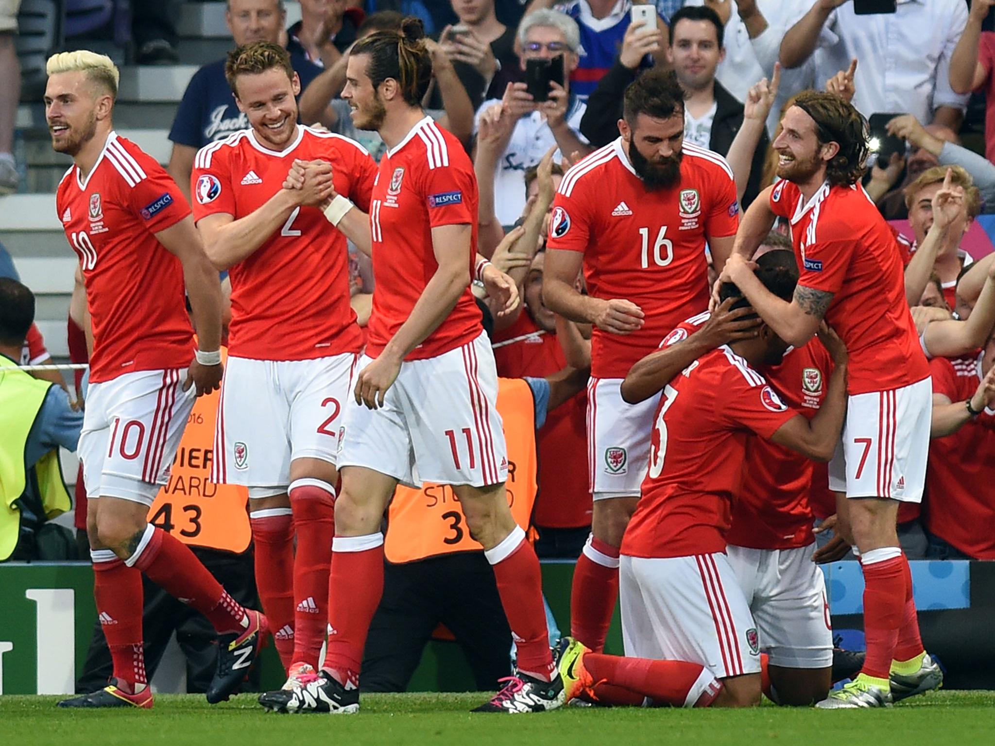 Allen celebrating Taylor's goal against Russia on Monday