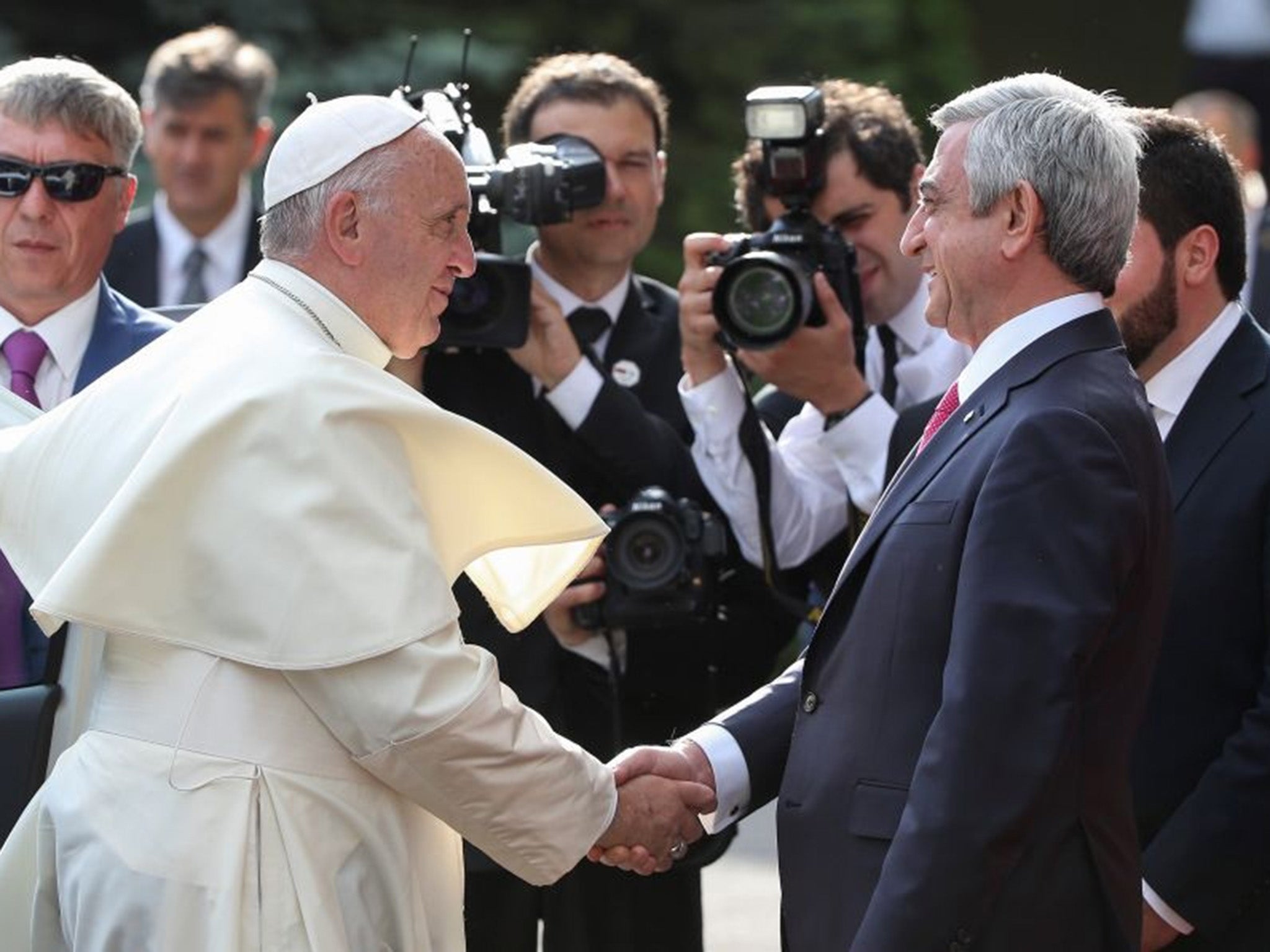 Pope Francis greeted by Armenia's President Serzh Sargsyan. Armenia has pushed for international recognition of the genocide