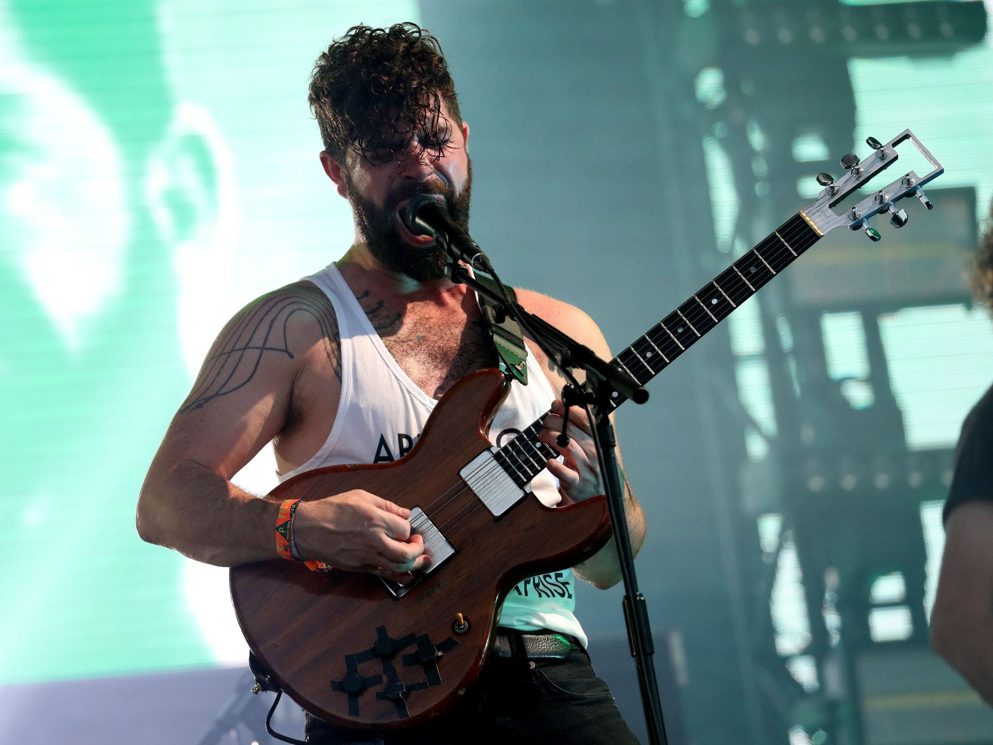 Yannis Philippakis of Foals performs on the Pyramid Stage at Glastonbury