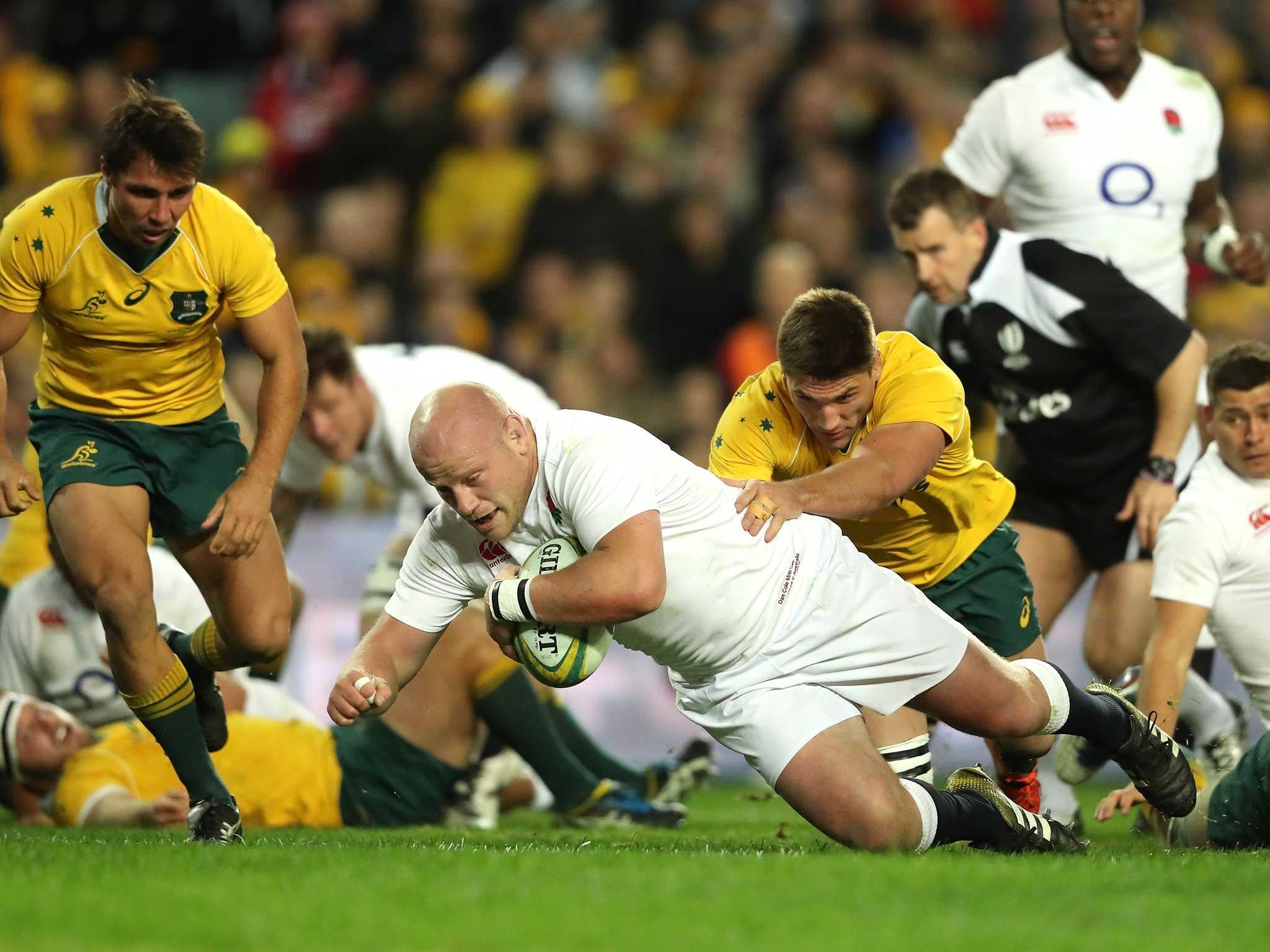 Dan Cole scrambles over the line to set England on their way (Getty)