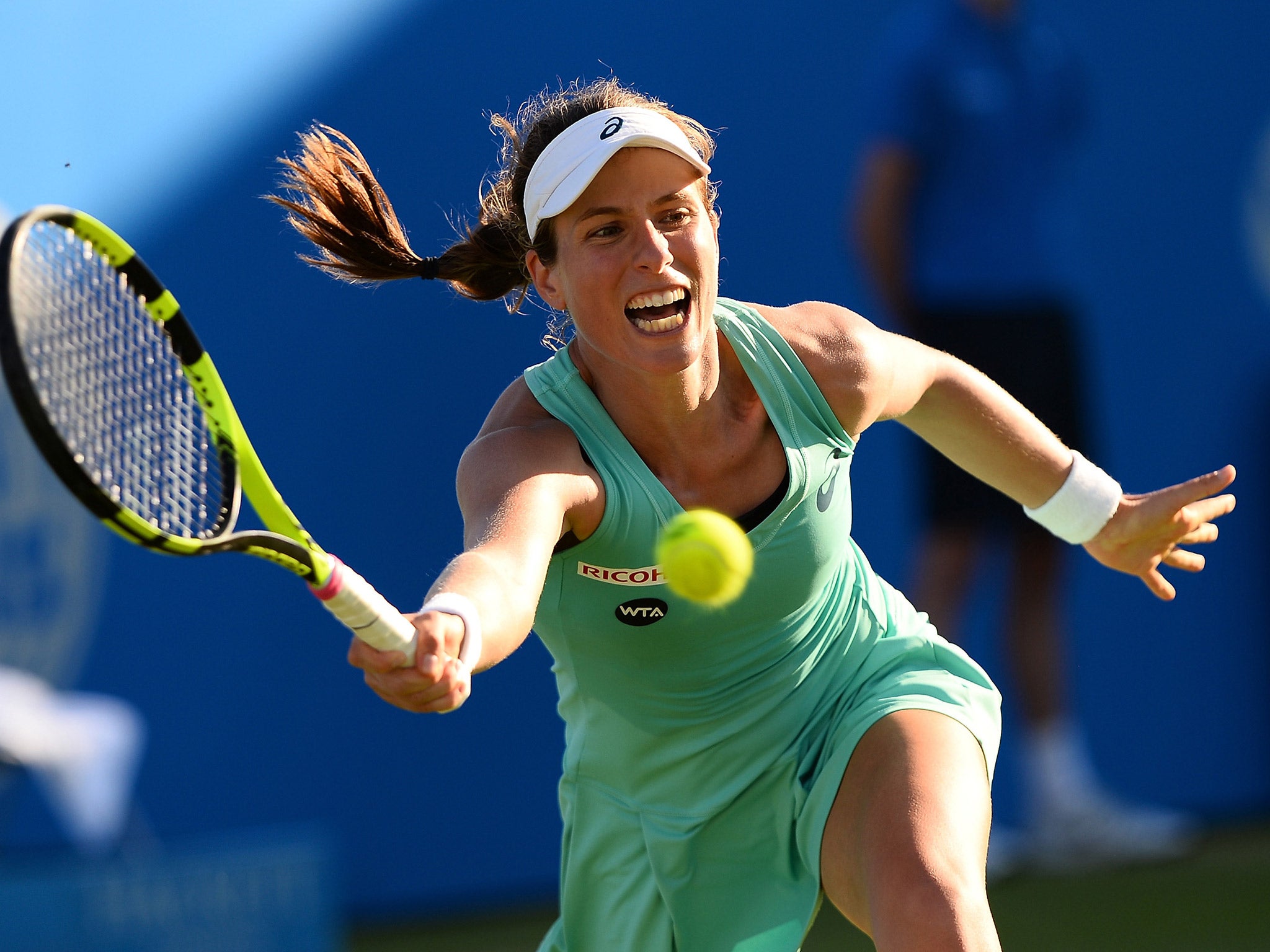 Johanna Konta returns a shot during her semi-final clash against Karolina Pliskova at Eastbourne
