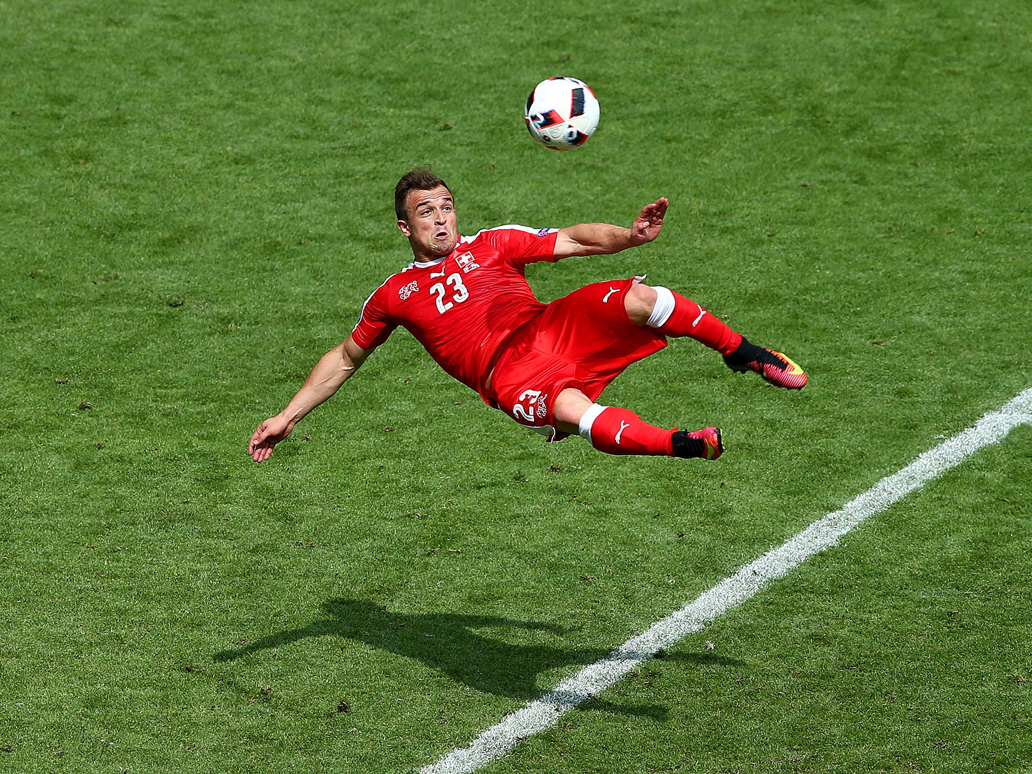 Xherdan Shaqiri hits a bicycle kick to score an equalising goal for Switzerland against Poland (Getty)