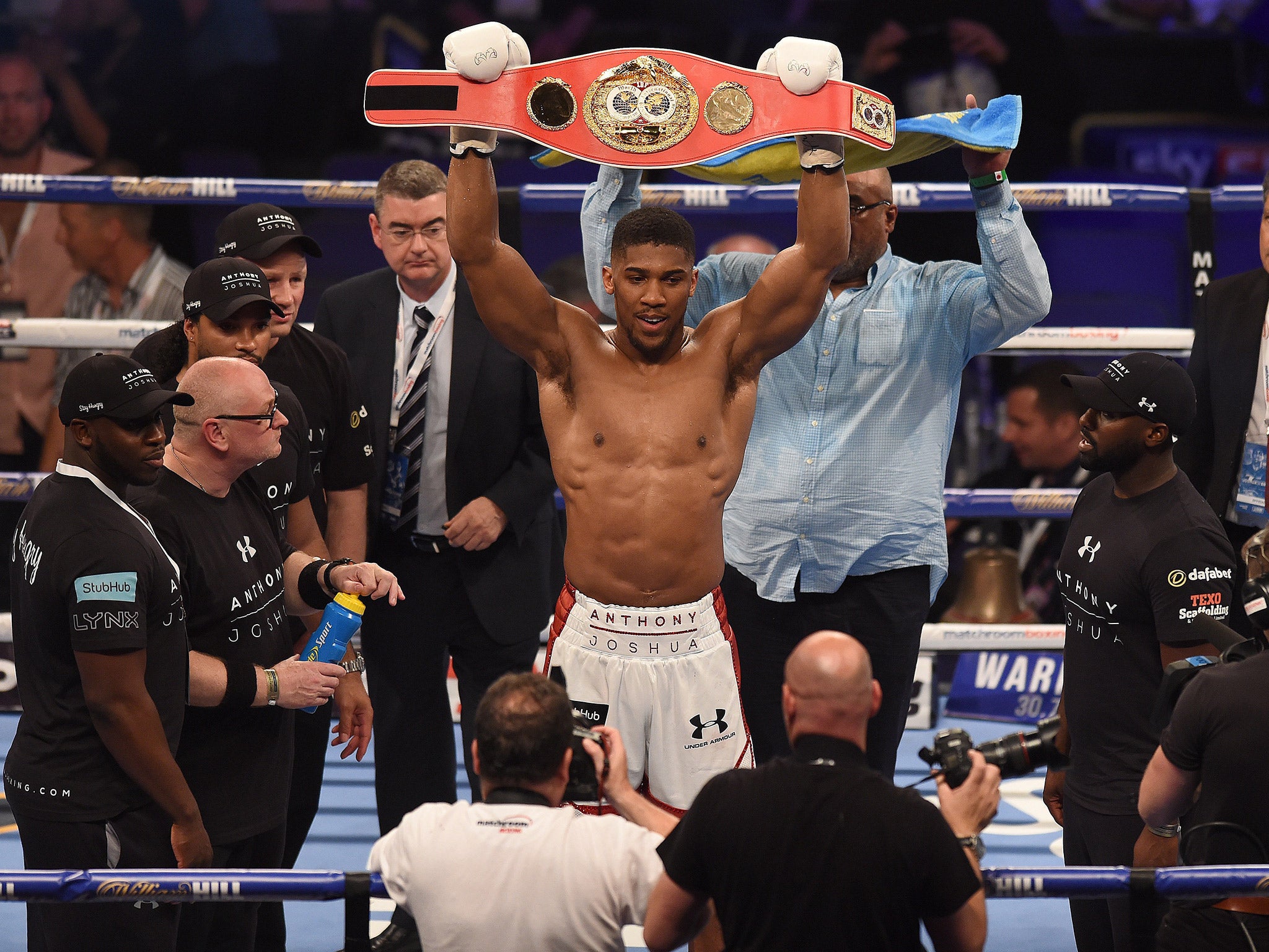 Anthony Joshua celebrates retaining his IBF heavyweight world title