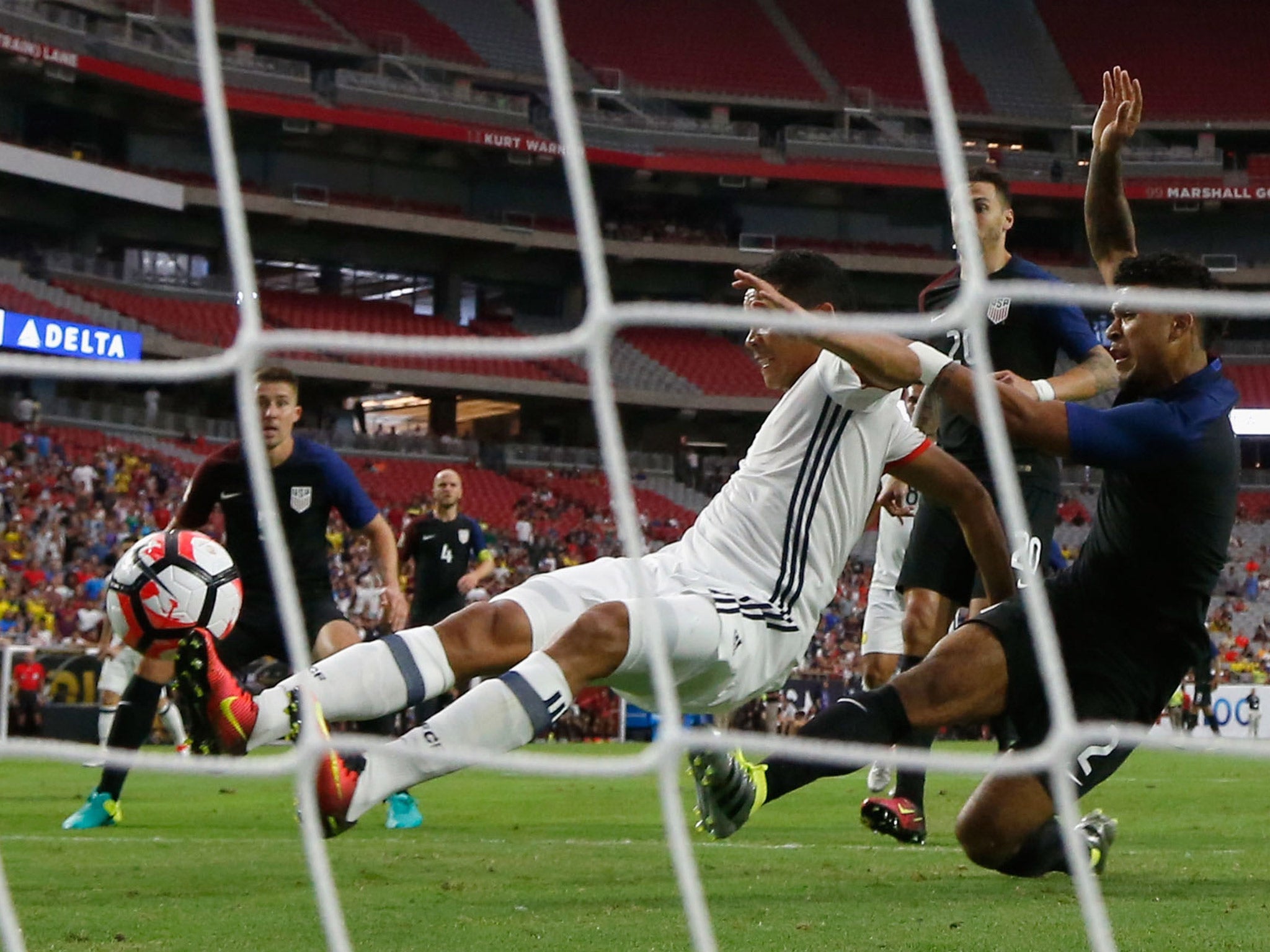 Carlos Bacca scores the match-winning goal in the Copa America third-place play-off between Colombia and the US