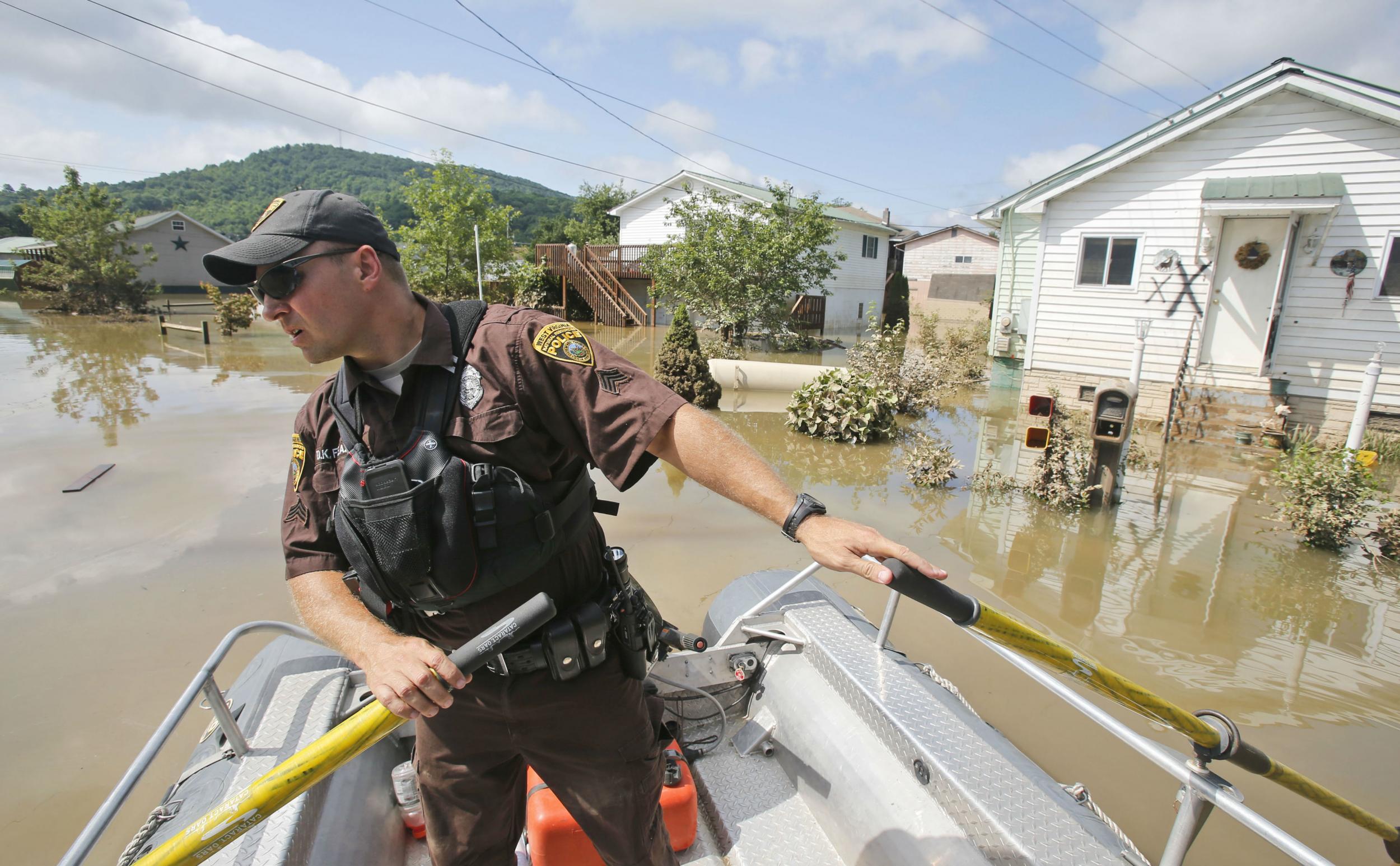 Rescue crews travelling house to house searching for survivors