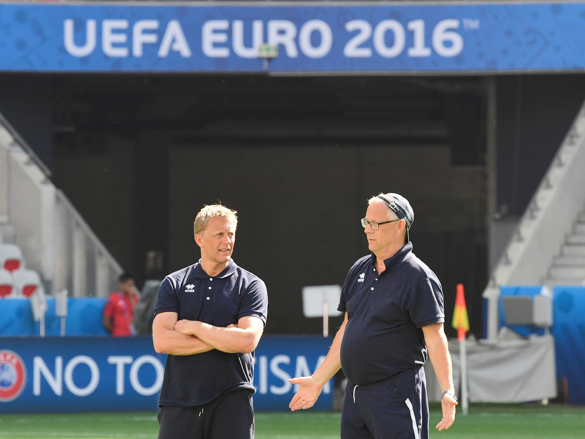 Iceland coaches Heimir Hallgrinsson and Lars Lagerback watch a training session