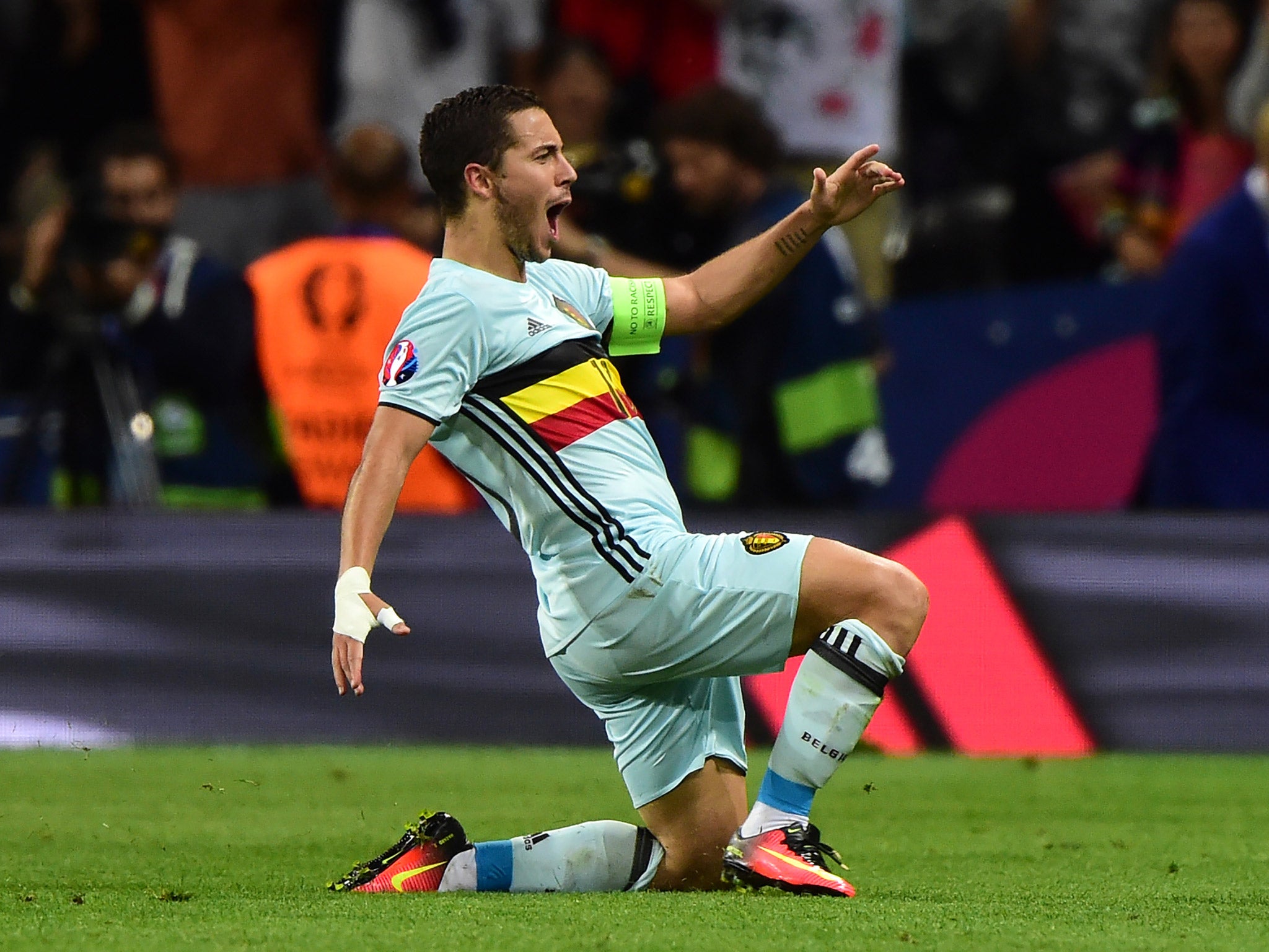 Eden Hazard celebrates scoring Belgium's third goal against Hungary