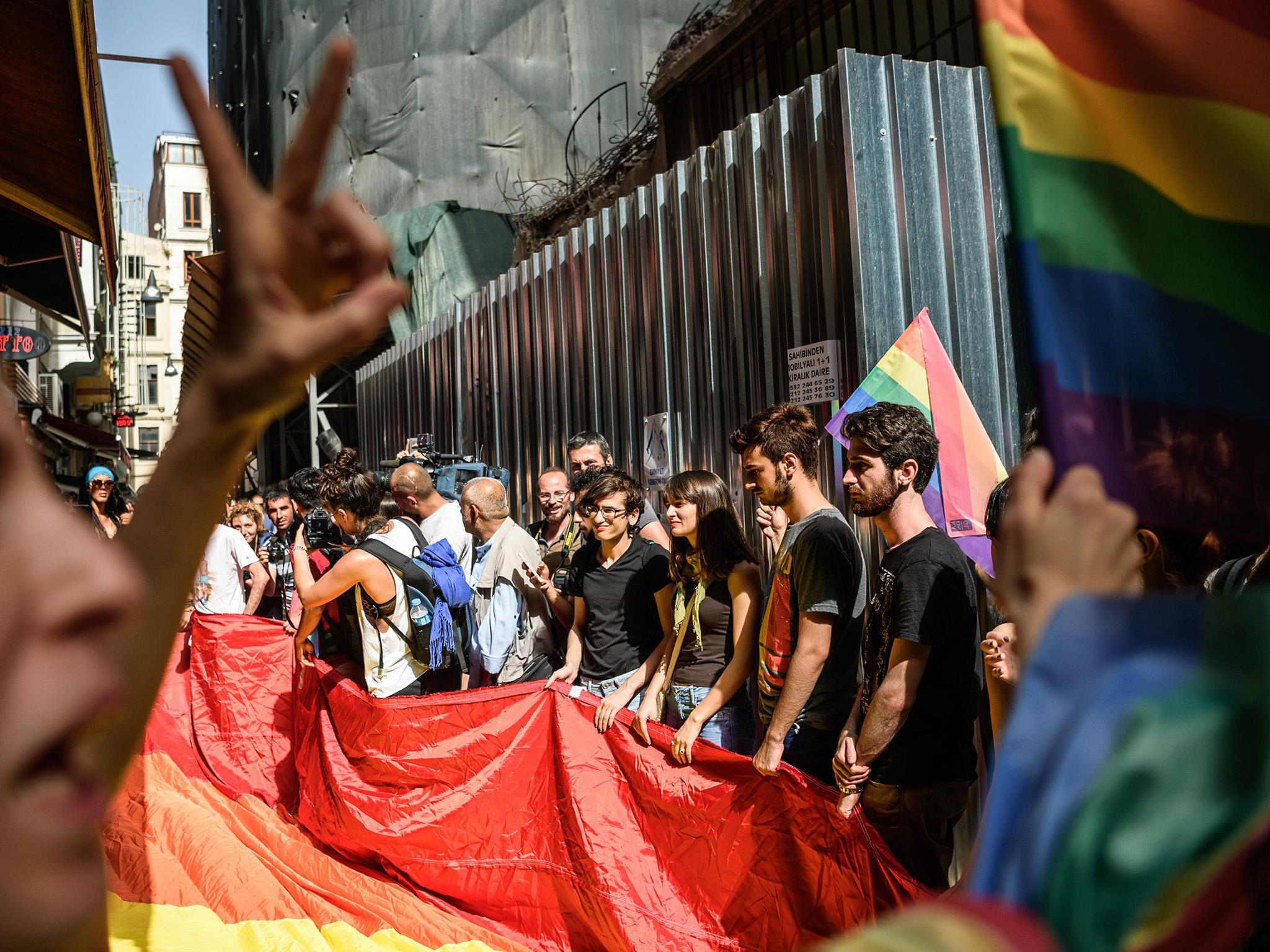 Turkish riot police fired rubber bullets and tear gas to break up a rally staged by the LGBT community in Istanbul