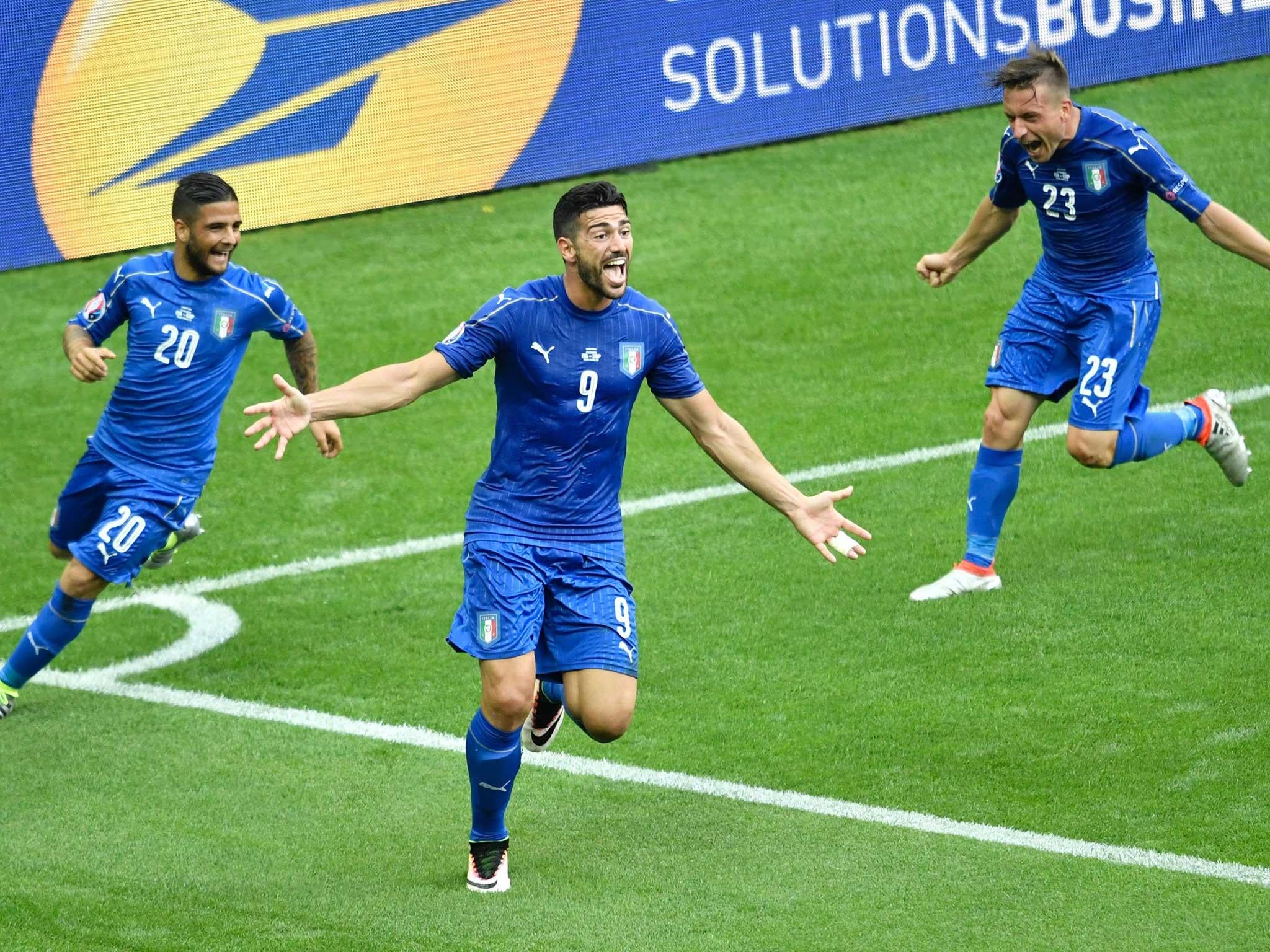 Graziano Pelle wheels away delighted after scoring for Italy during Euro 2016