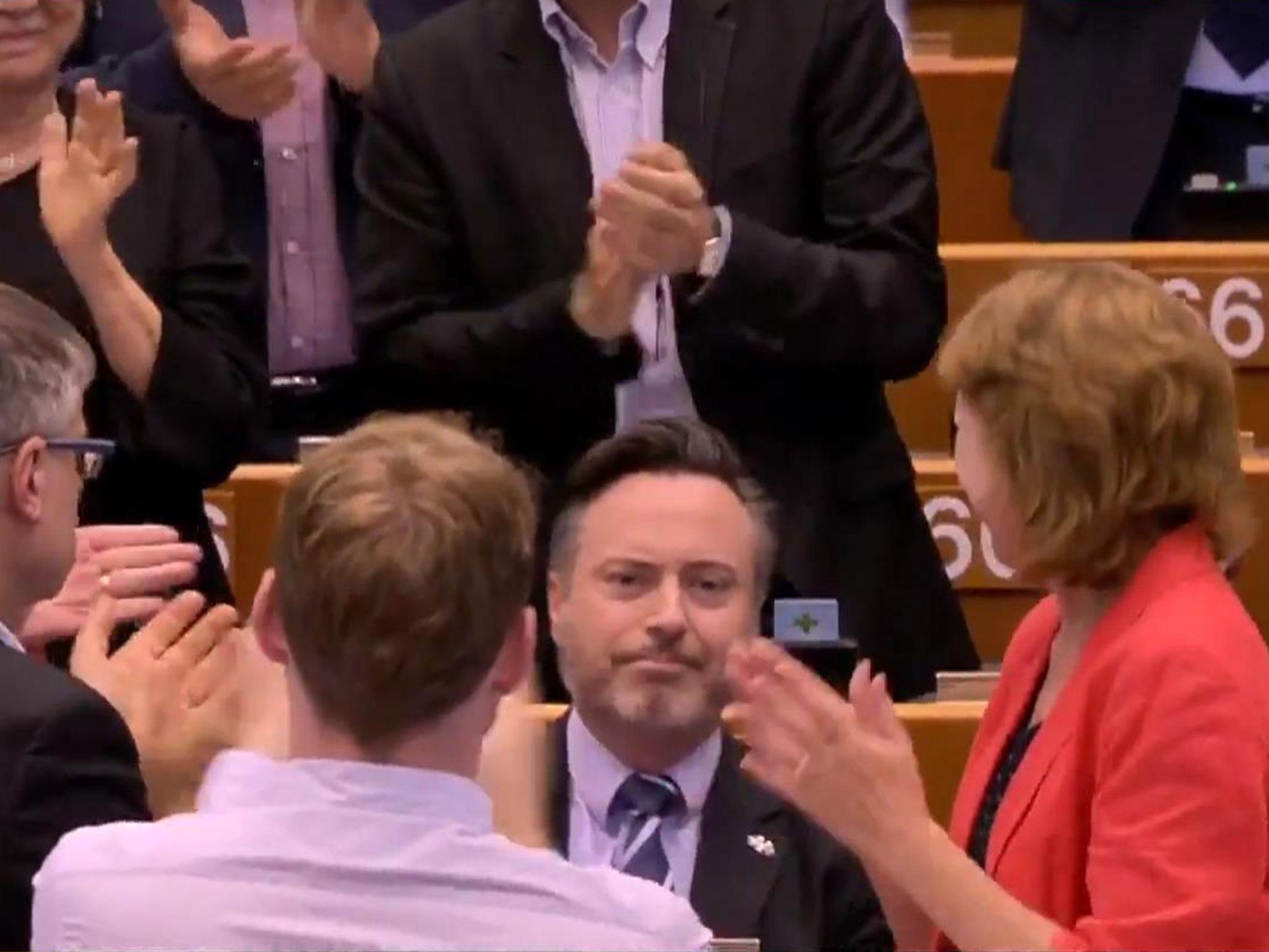 Scottish National Party MEP Alyn Smith receives a standing ovation in the European Parliament