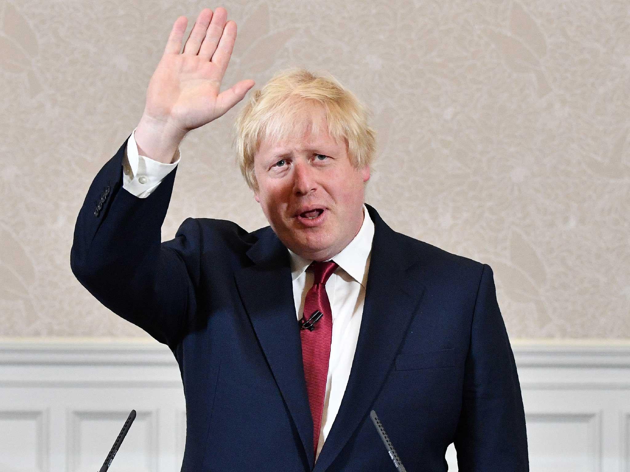 Brexit campaigner and former London mayor Boris Johnson prepares to leave after addressing a press conference in central London