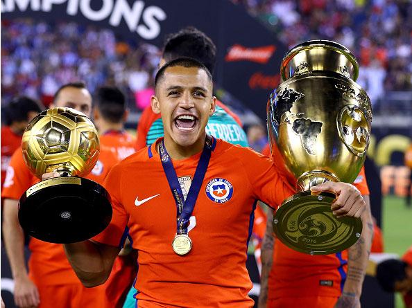 Alexis Sanchez recovered enough to celebrate with the Copa America trophy and the player of the final award (Getty)