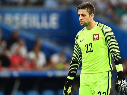 Lukasz Fabianski was unable to stop any of Portugal's shoot-out penalties (Getty)