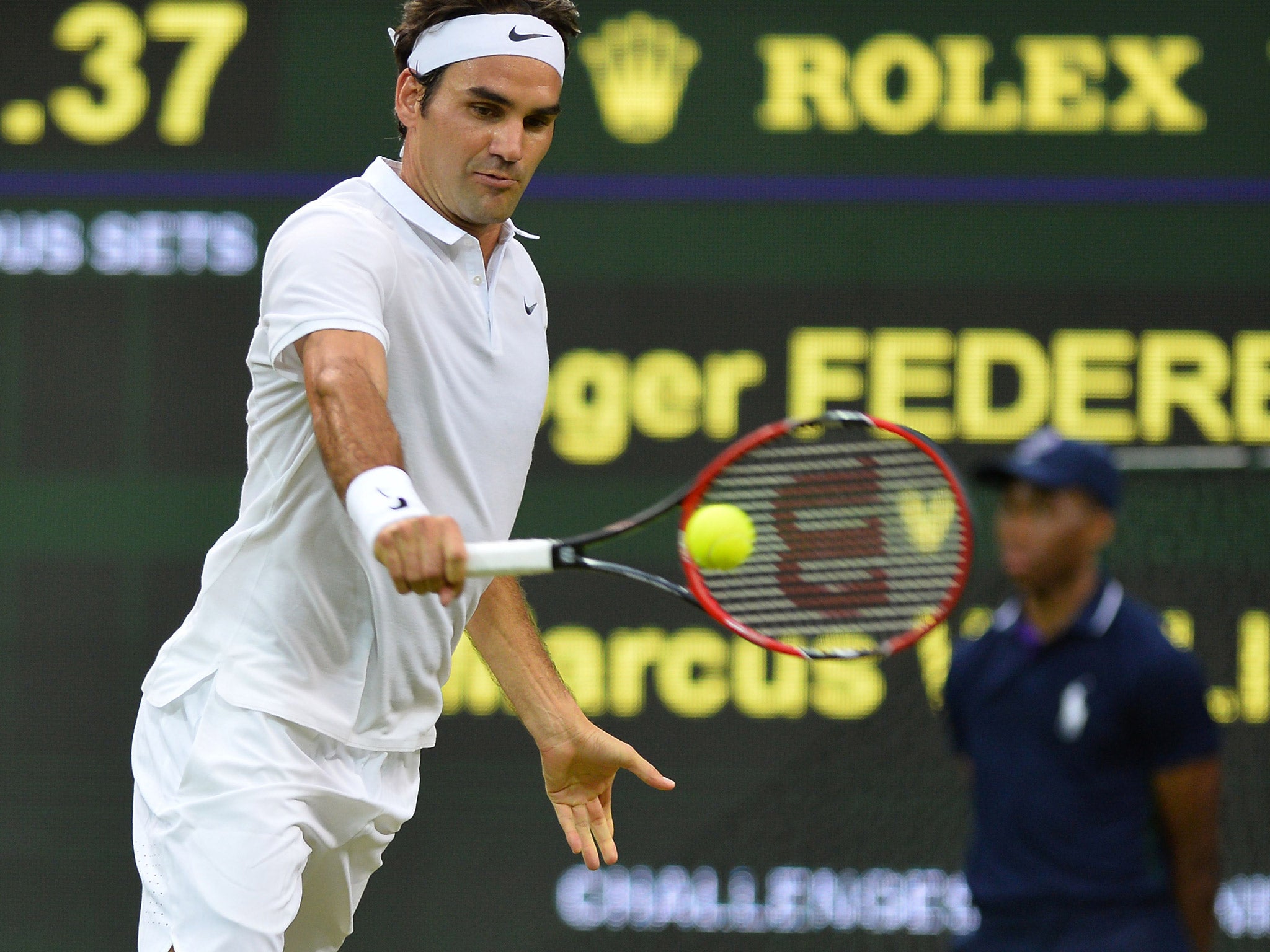 Roger Federer takes on Britain's Dan Evans in the third round at Wimbledon