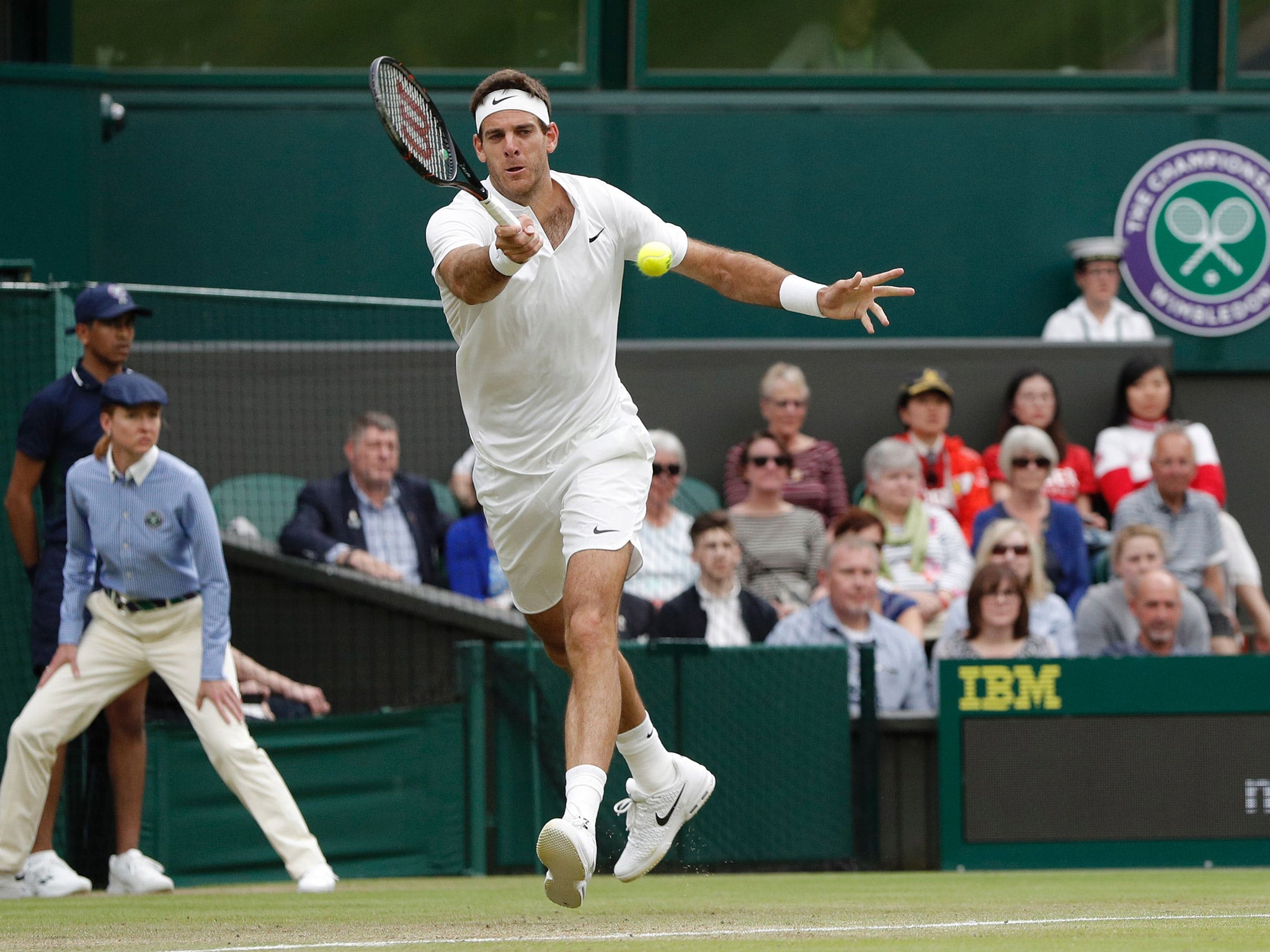 Juan Martin Del Potro returns during his match against Stanislas Wawrinka