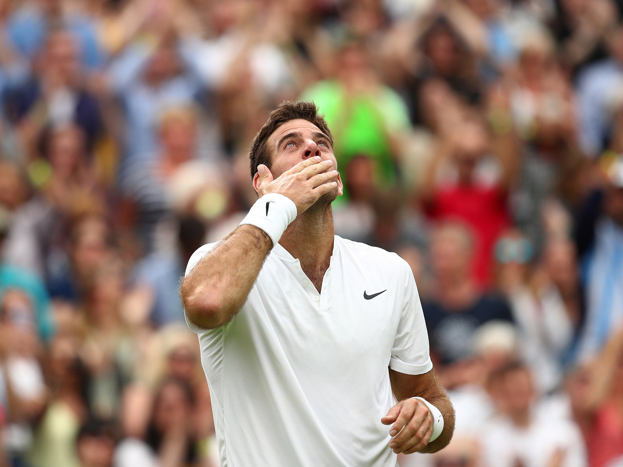 Juan Martin Del Potro celebrates his second-round victory over Stanislas Wawrinka