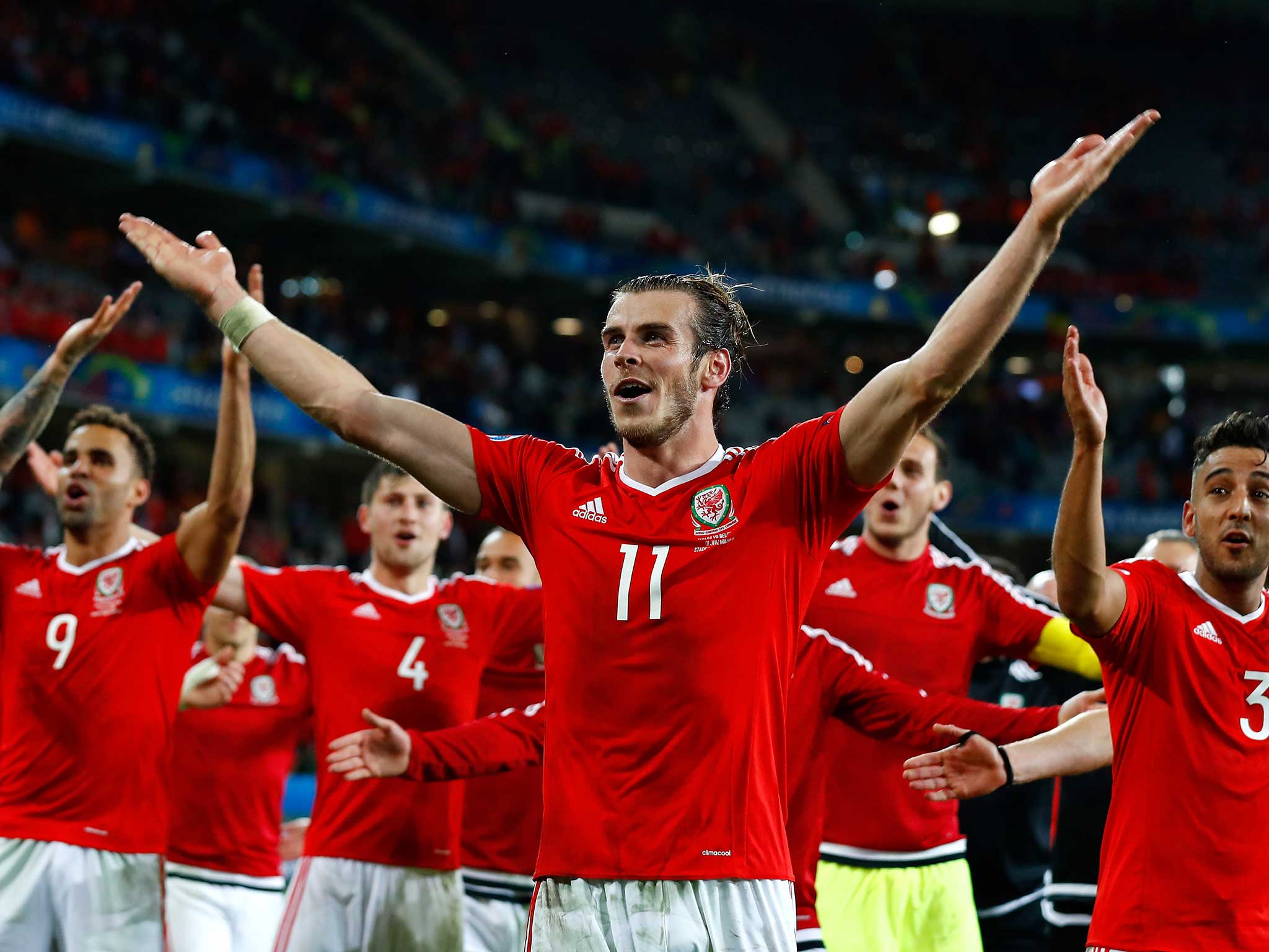 Bale greets the visiting Wales fans in Lille at full-time