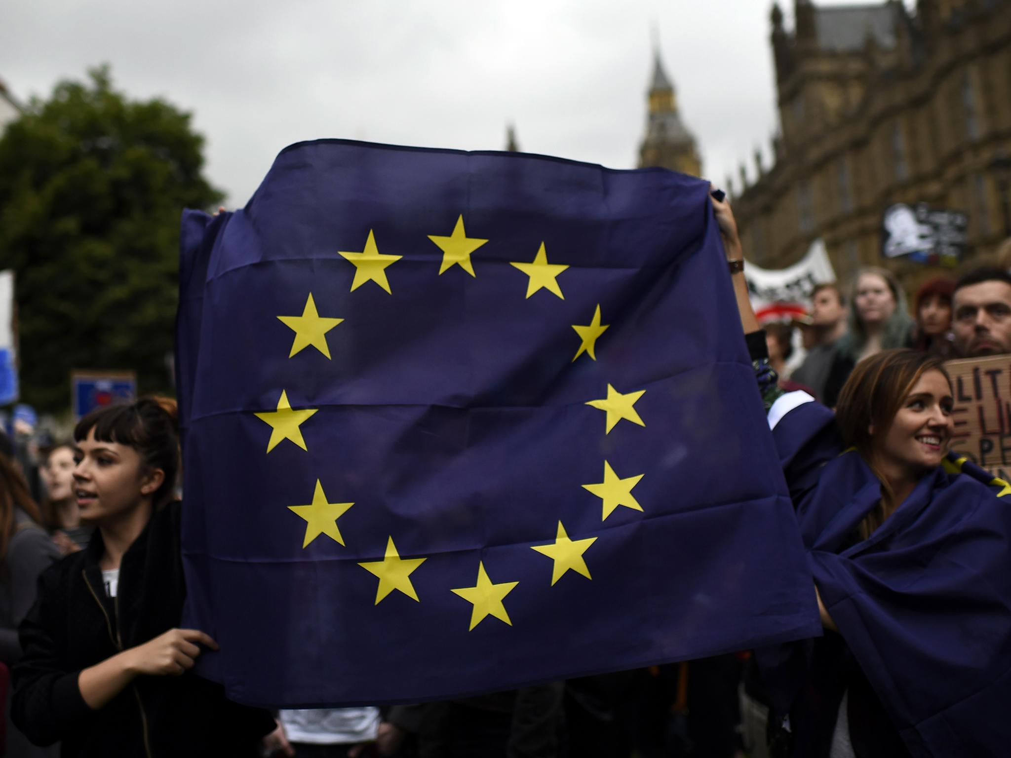 Demonstrators march outside the Houses of Parliament during a protest aimed at showing London's solidarity with the European Union following the recent EU referendum, in central London, Britain June 28, 2016