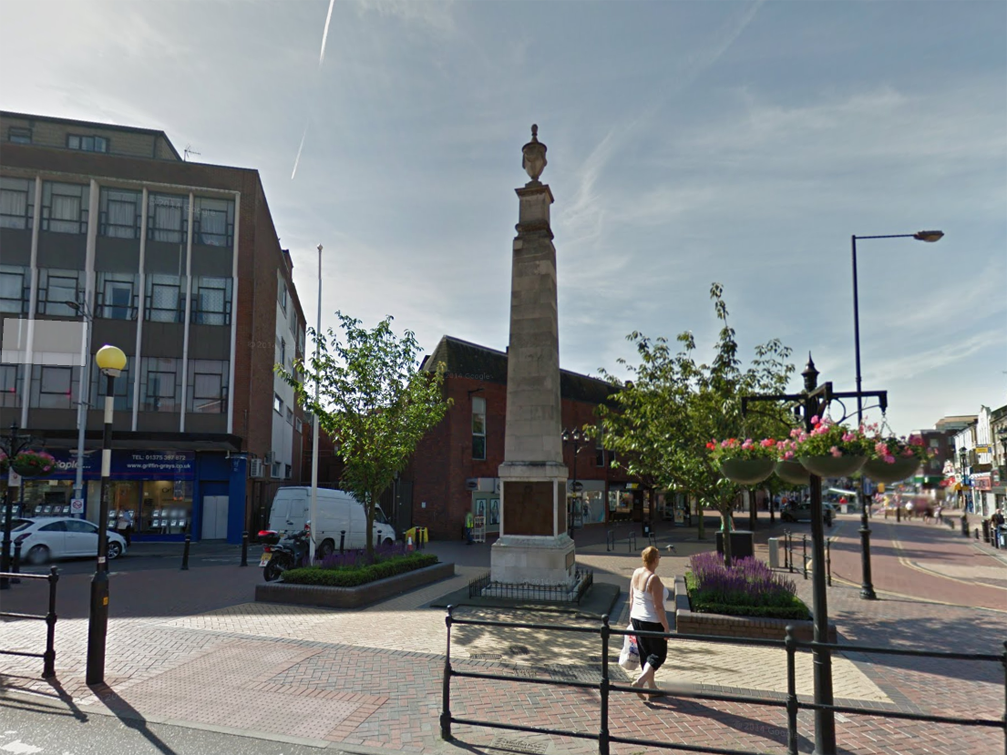 Pictures of the woman urinating at the memorial in Essex were shared online