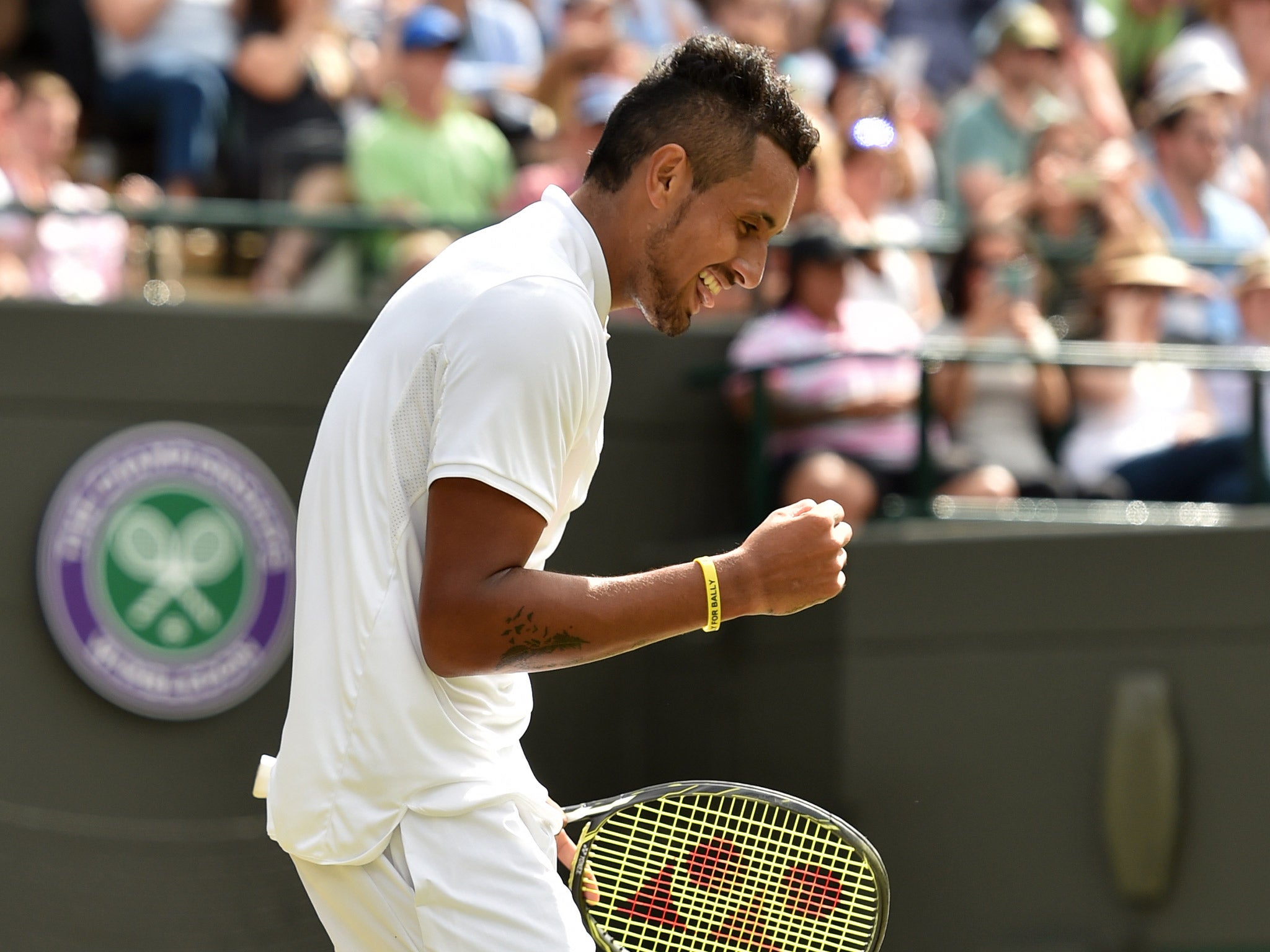 Nick Kyrgioscelebrates after beating Feliciano Lopez at Wimbledon