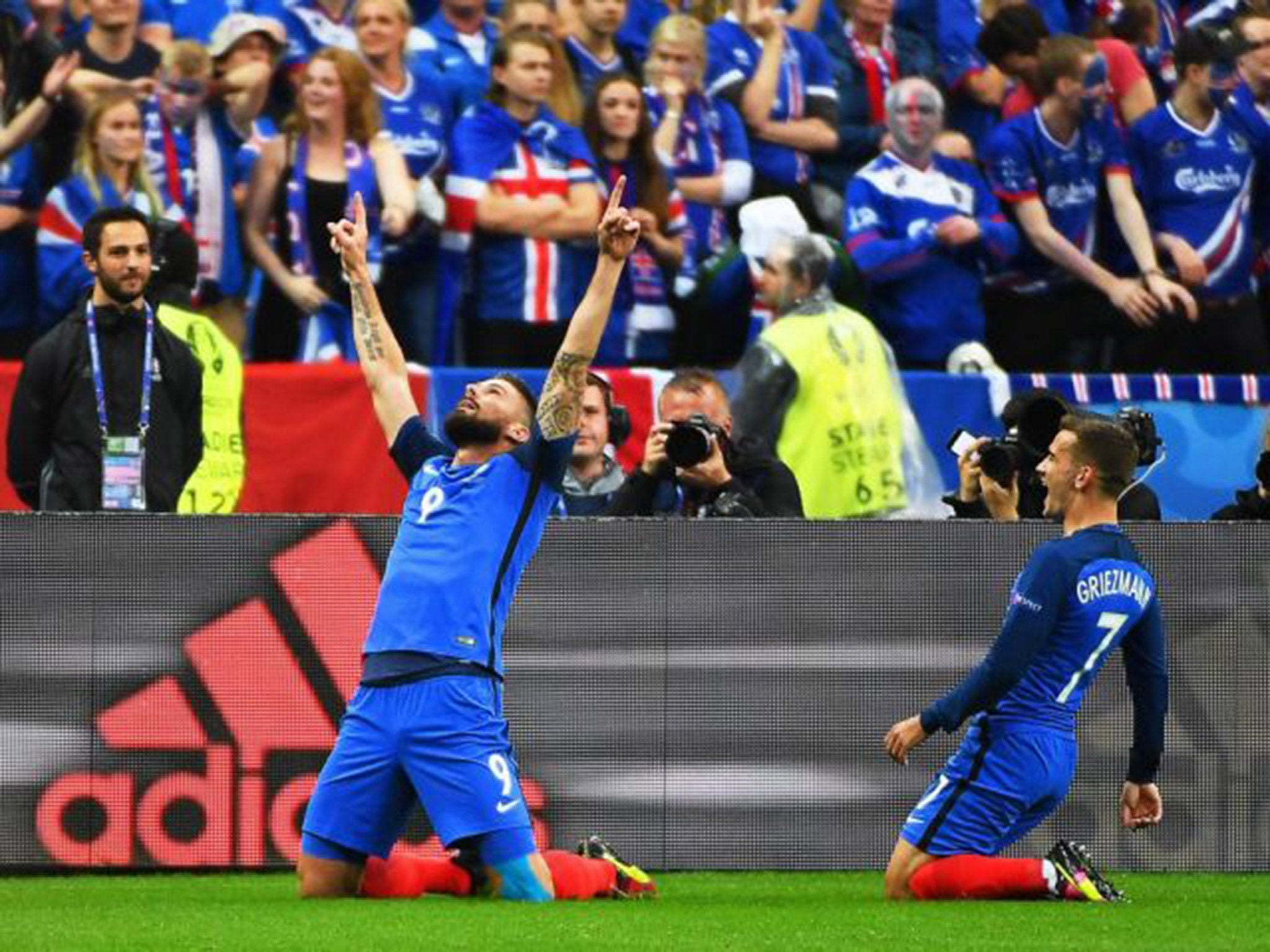 Olivier Giroud celebrates after scoring for France against Iceland