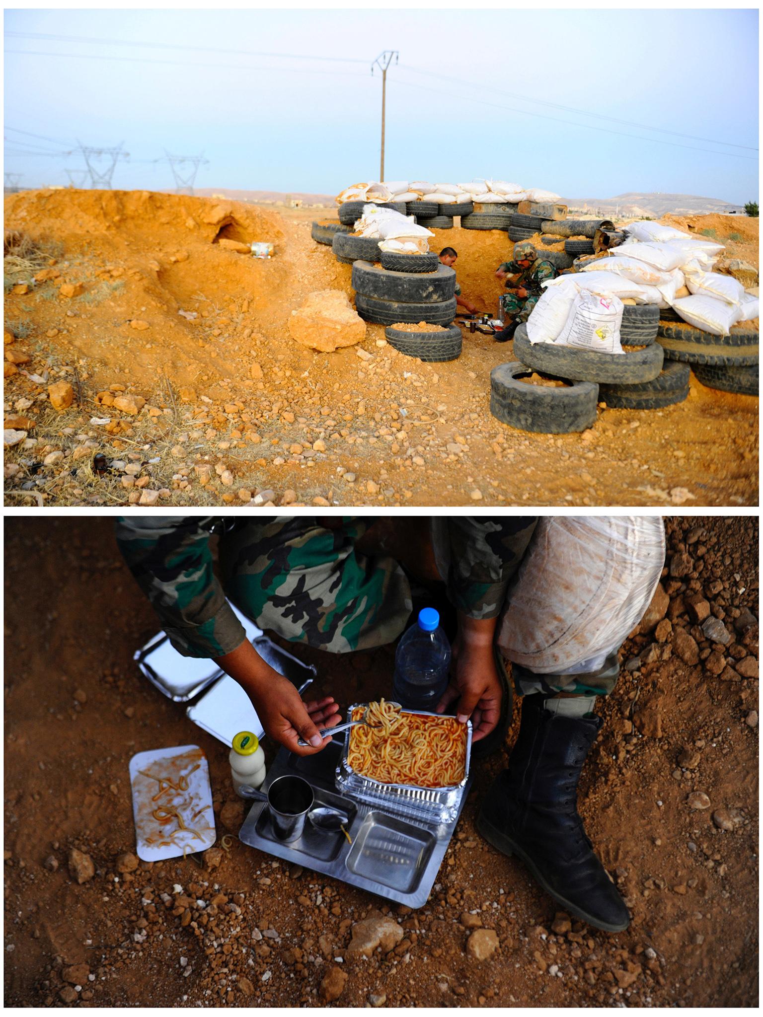 Damascus, Syria: Syrian army recruits eating iftar of spaghetti at a guard post inside a military training camp on the outskirts of the city