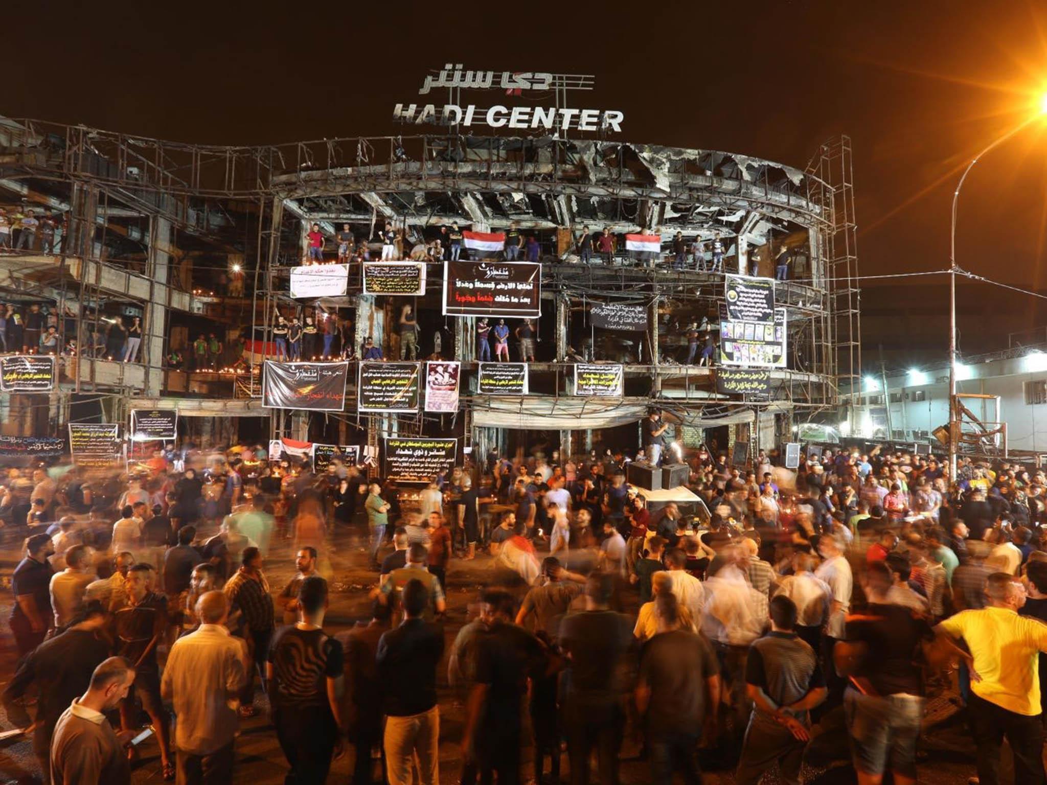 People paid their respects on Monday night to the people who died in the attack