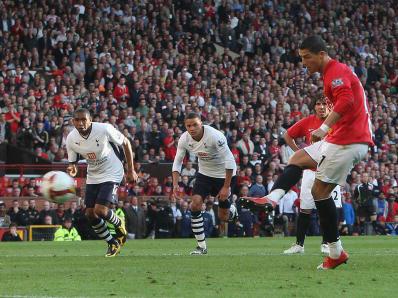 Cristiano Ronaldo scores his first against Spurs from the spot at Old Trafford (Getty)