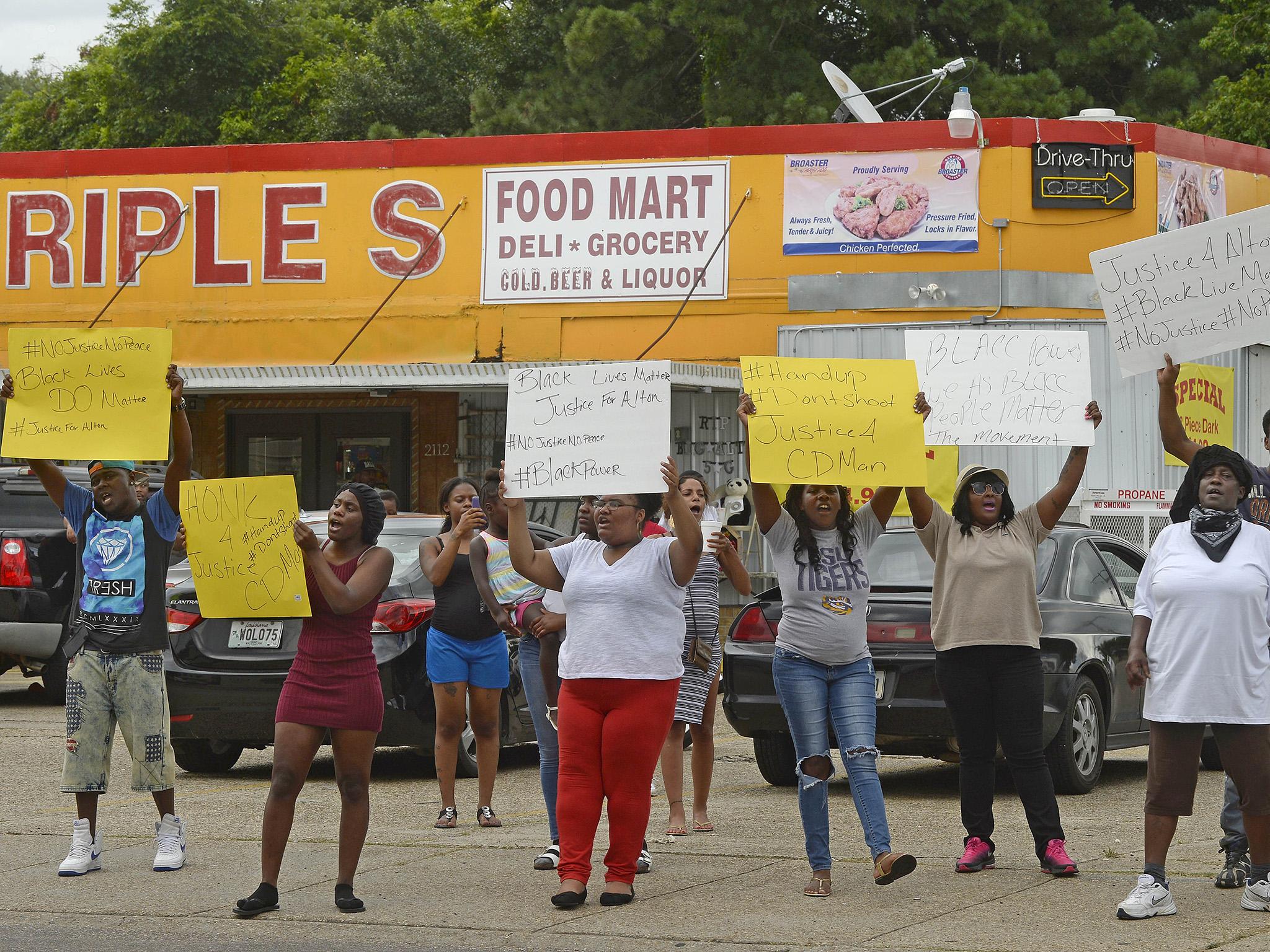 Family and friends of Alton Sterling protest on the corner of Fairfields Ave, where Alton was killed