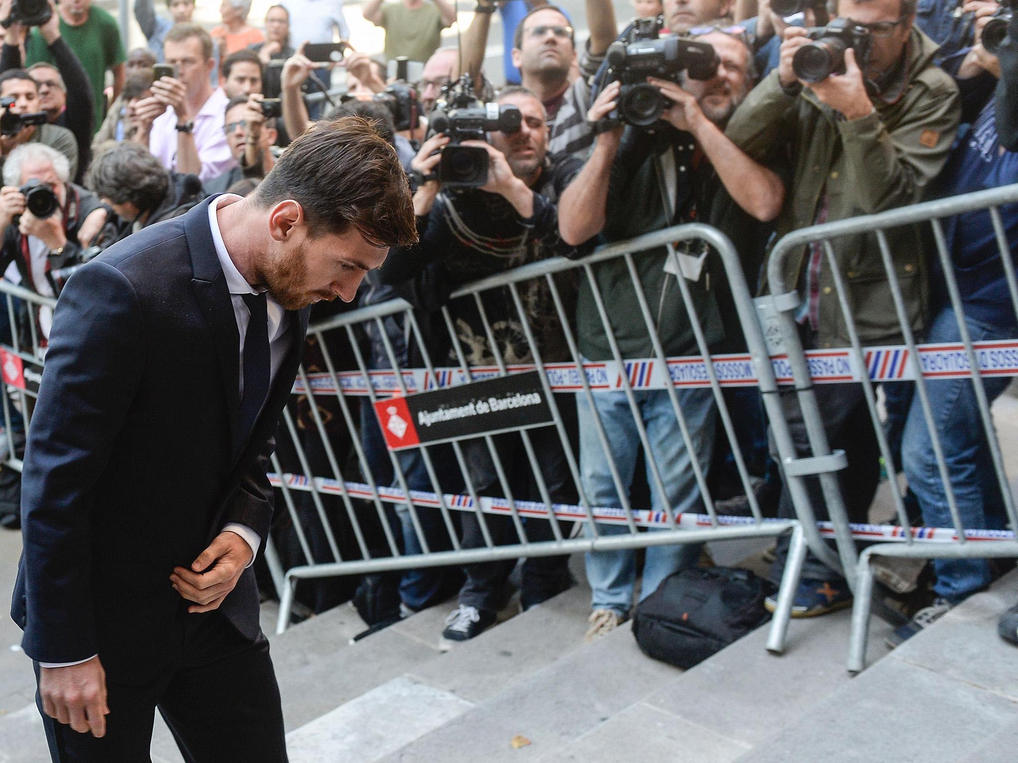 Messi arriving at a Barcelona courthouse