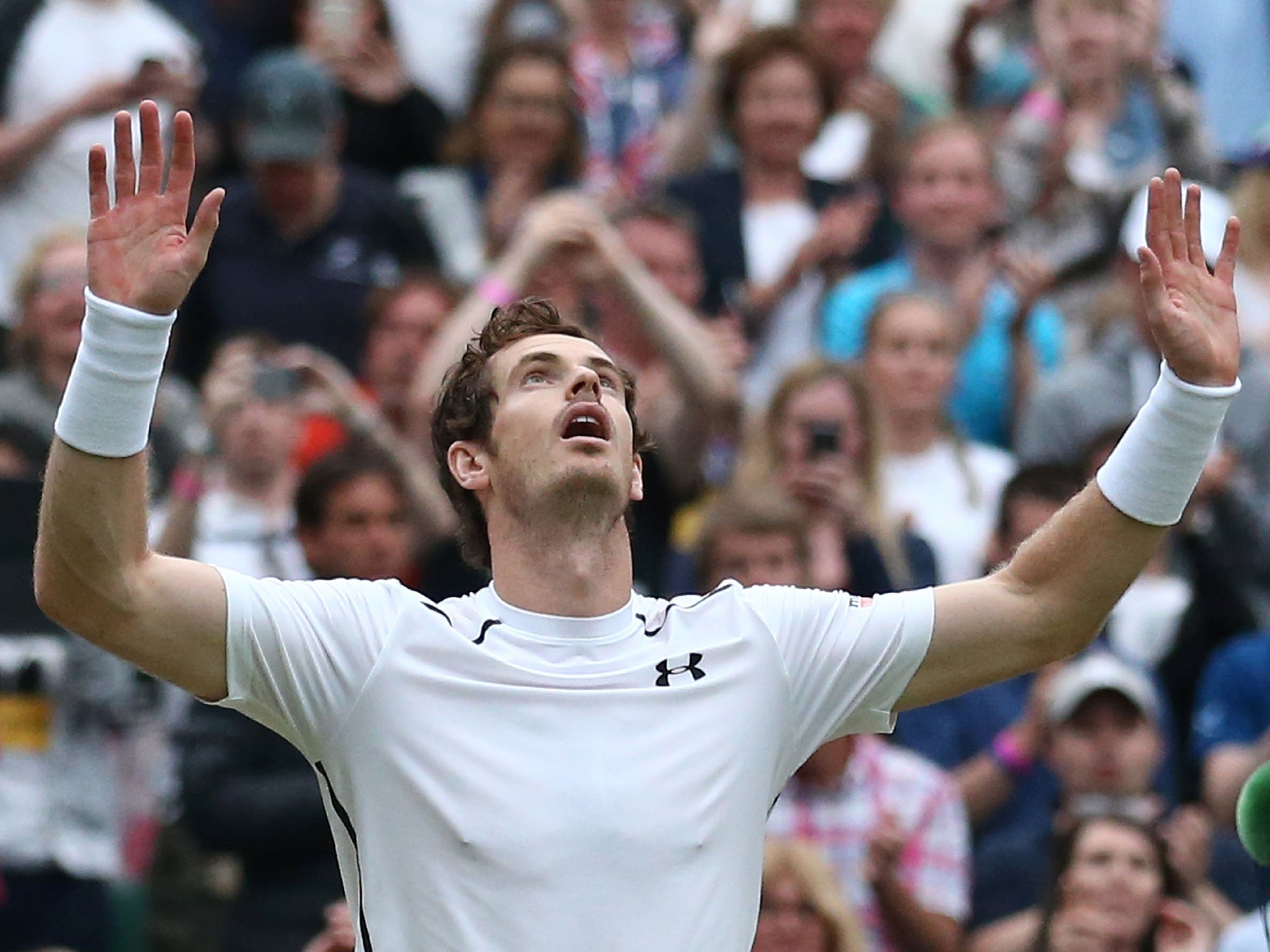 Murray celebrates his victory at the end of his epic quarter-final