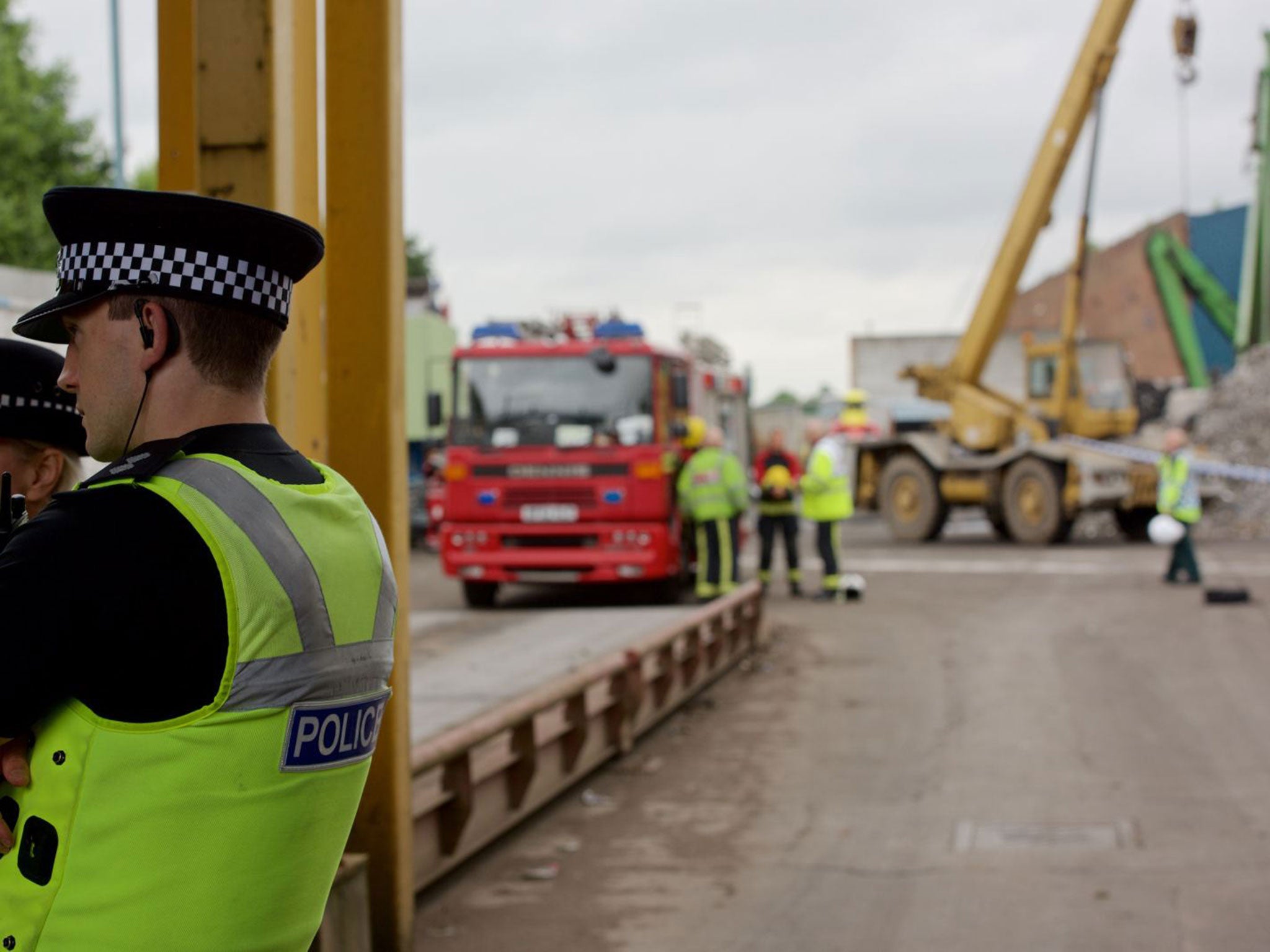 Police say they were alerted at 8:45am to reports a wall had collapsed at Hawkeswood Metal