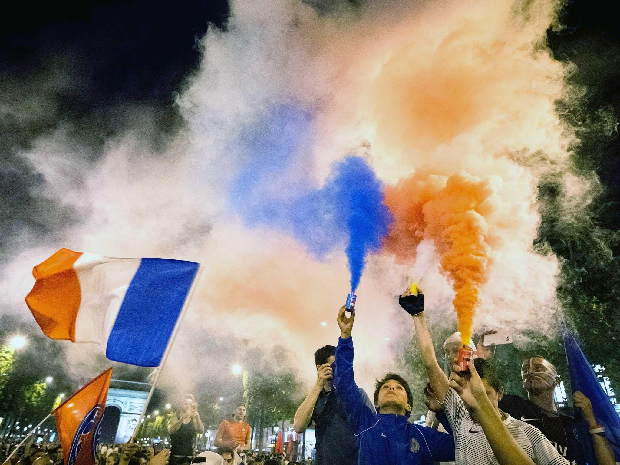 French football fans celebrate following Thursday’s semi-final win against Germany