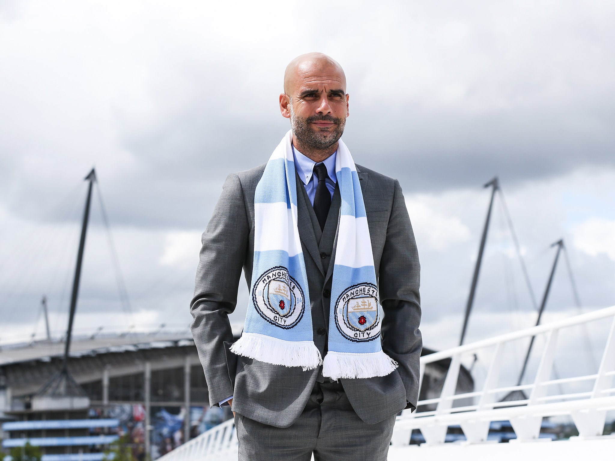 Pep Guardiola is pictured on Manchester City training complex after his press conference