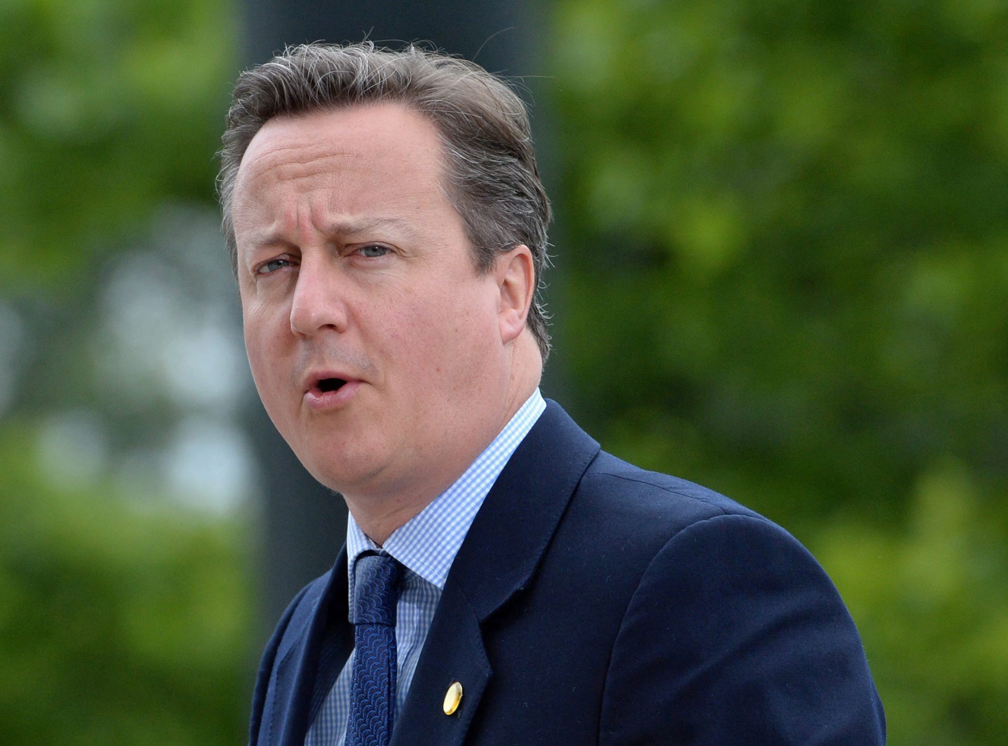 British Prime Minister David Cameron arrives for the second day of NATO Summit in Warsaw, Poland