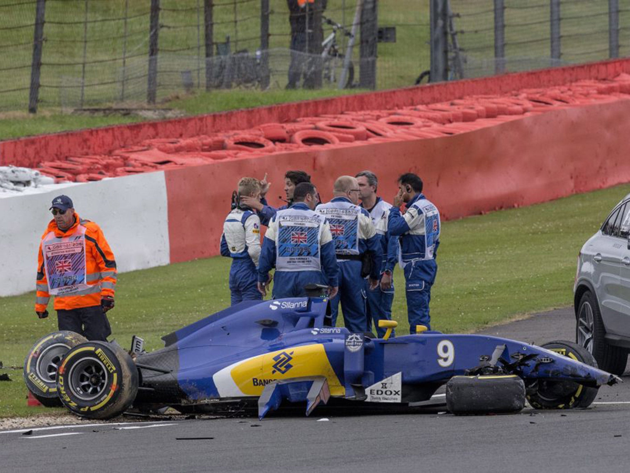 Marcus Ericsson is checked my the medical doctor after his crash in practice