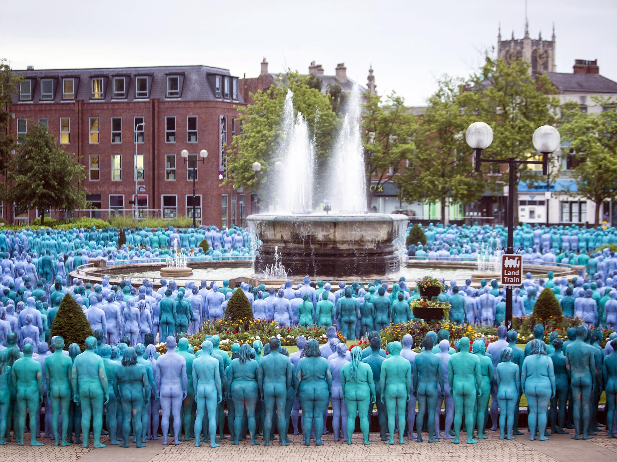 People take part in an installation entitled Sea of Hull, by artist Spencer Tunick