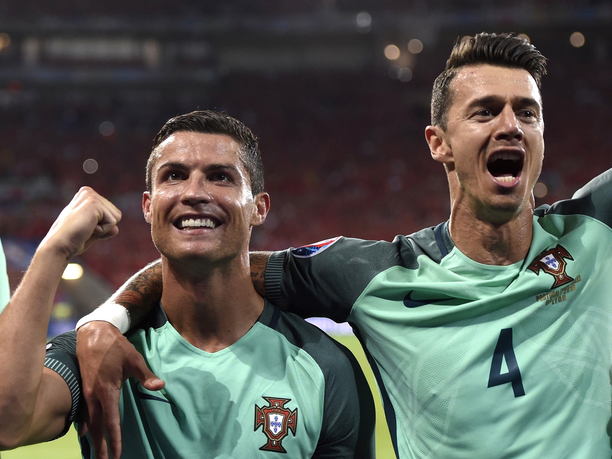 Ronaldo celebrates Portugal's semi-final victory with teammate Jose Fonte