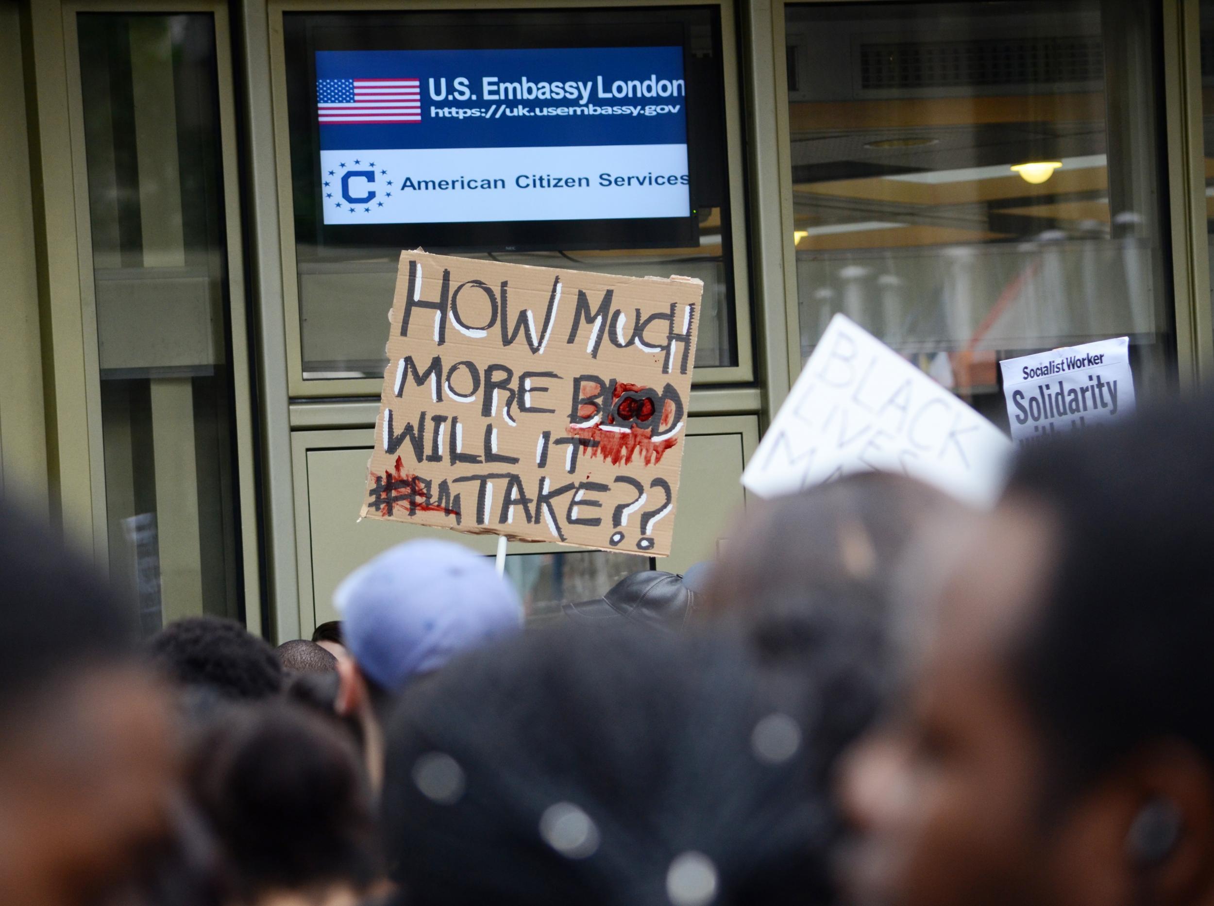 A placard held aloft at a Black Lives Matter protest in central London on 10 July