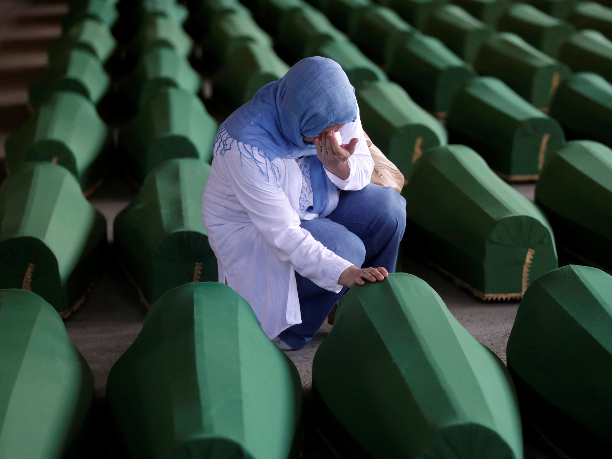 The remains of 127 victims have been buried next to more than 6,000 others found previously in mass graves