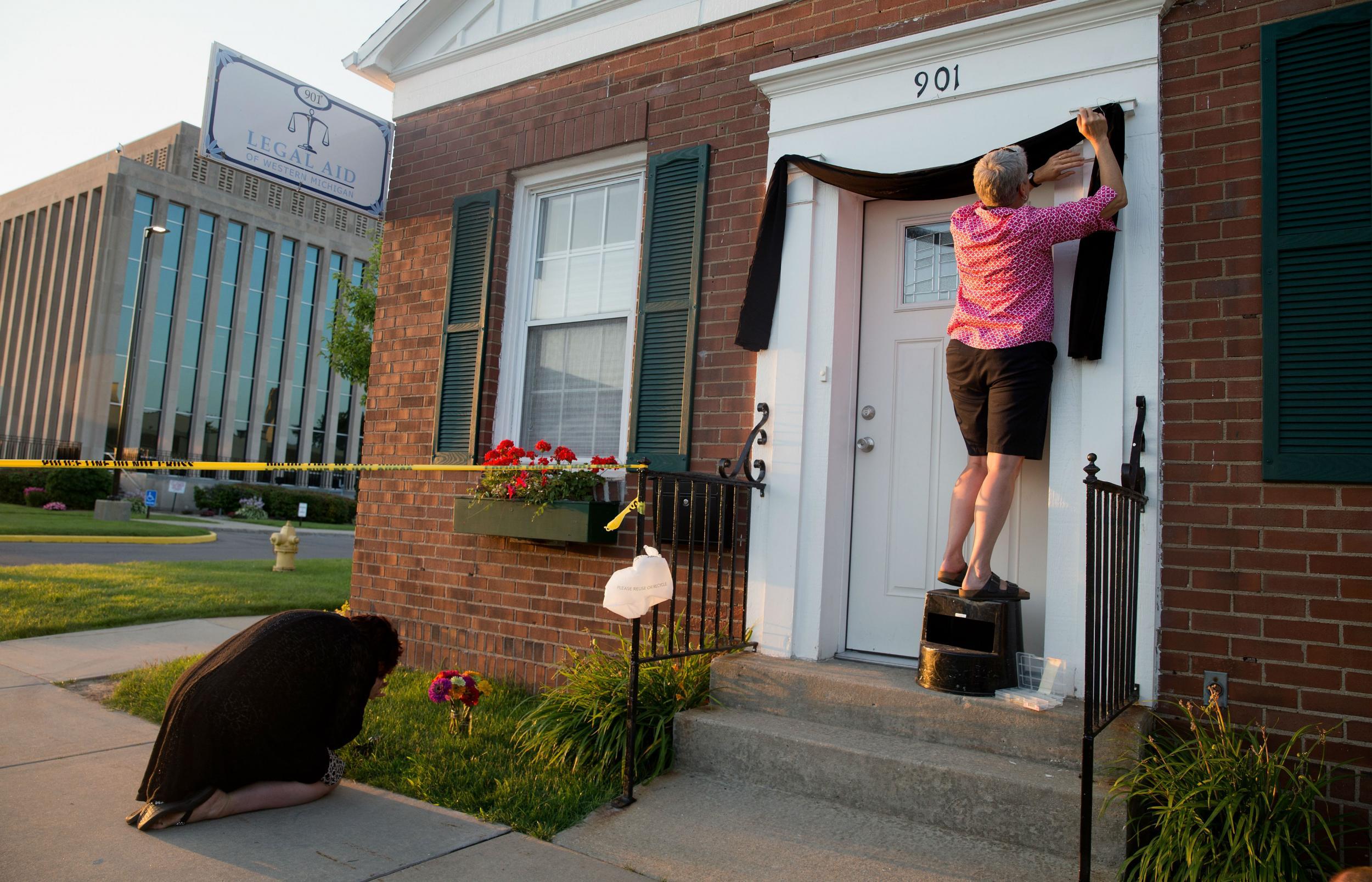 A woman mourns outside the Berrien County Courthouse, Michigan