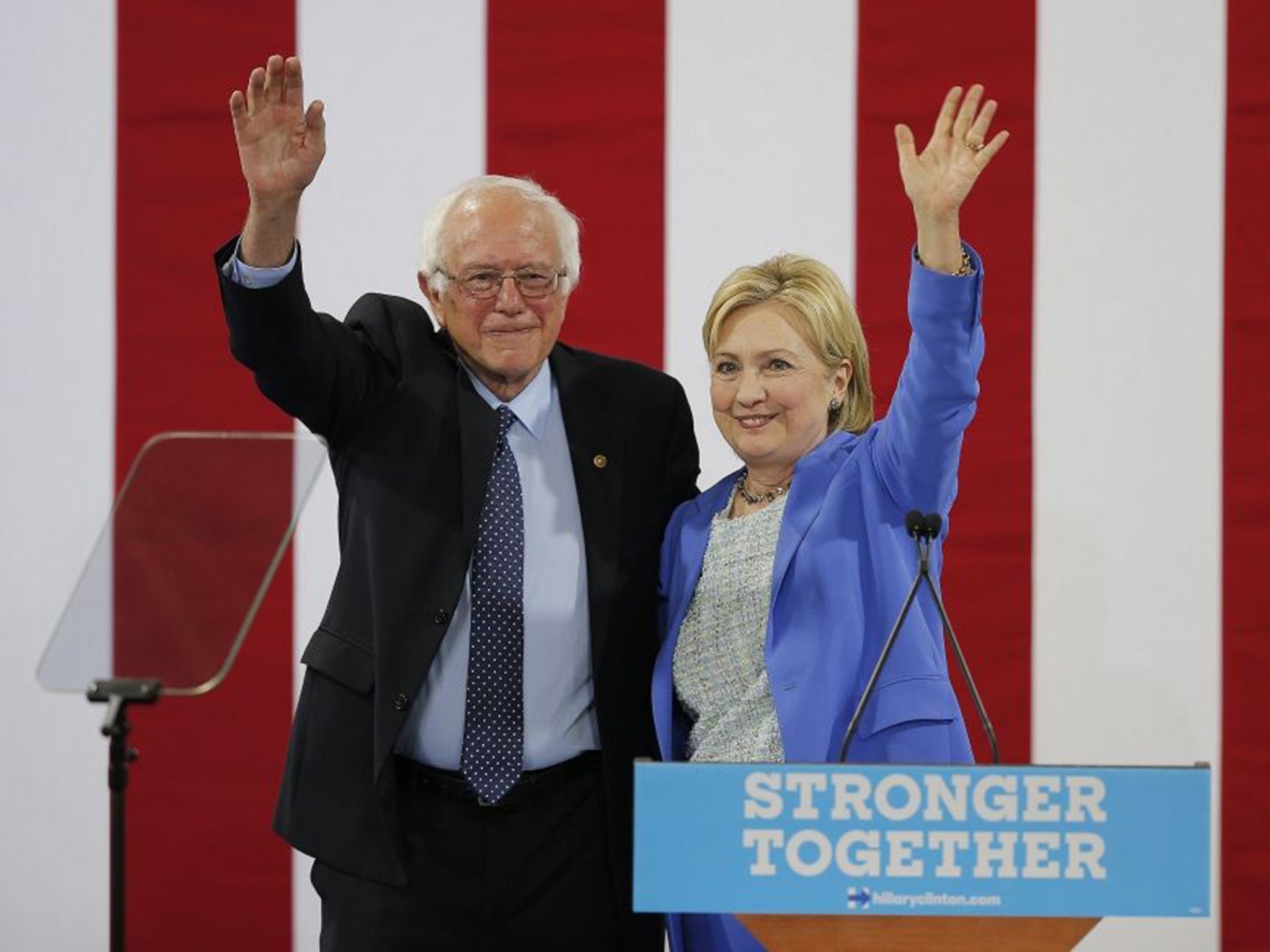 Democratic Presidential candidate Hillary Clinton with former Democratic Presidential candidate Bernie Sanders