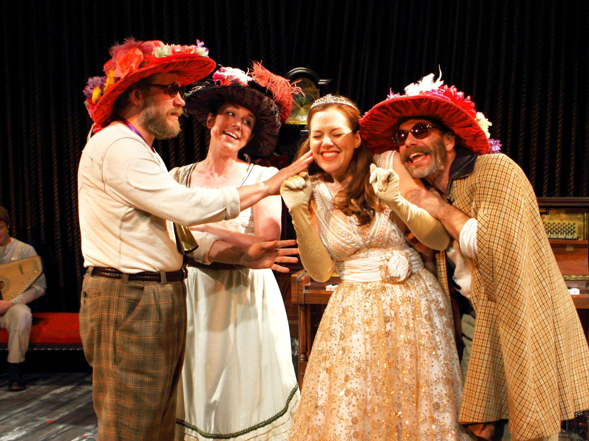 Andy Groteleuschen (Stepsister), Liz Hayes (Stepmother), Claire Karpen (Cinderella) and Noah Brody (Stepsister) in a scene from Into The Woods