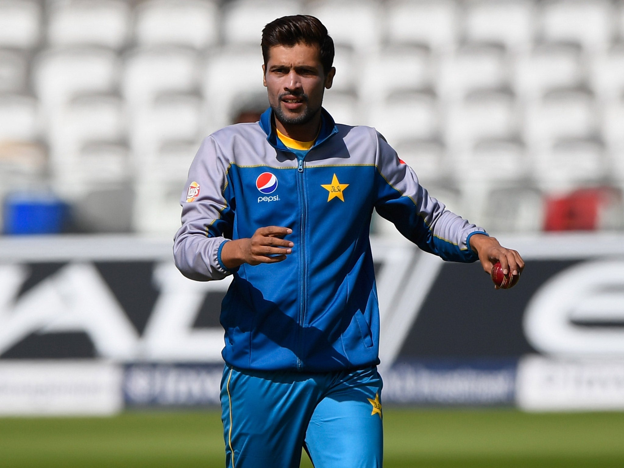 Mohammad Amir inspects the Lord's wicket