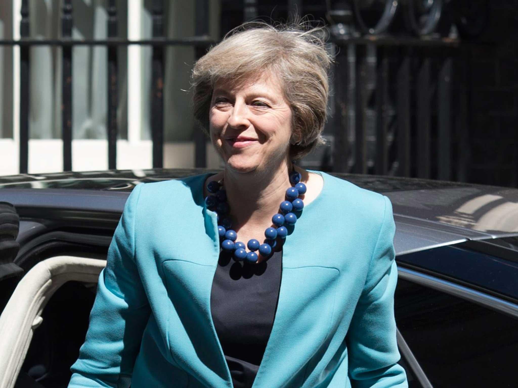 Theresa May arrives in Downing Street