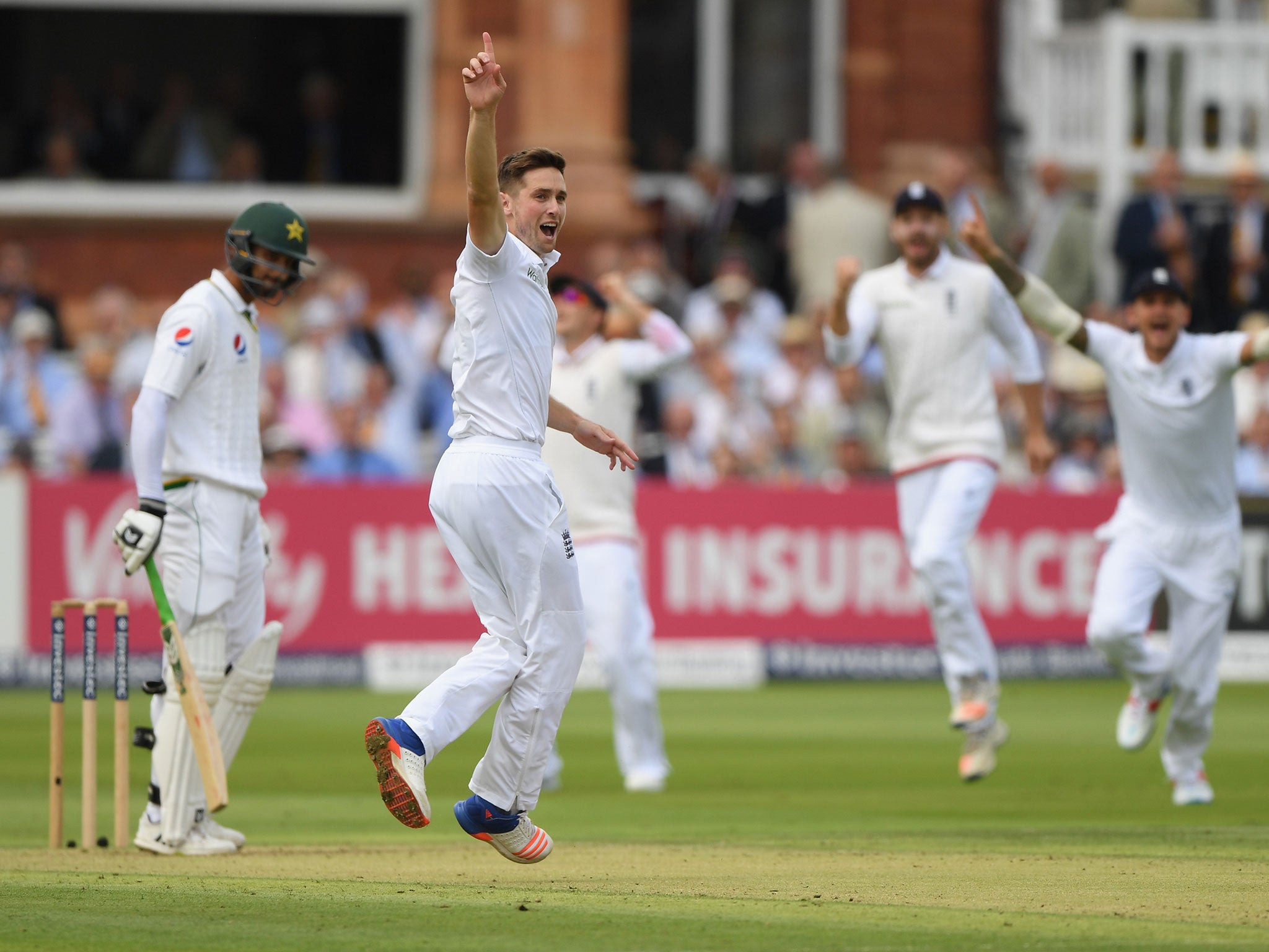 Chris Woakes appeals successfully for the wicket of Shan Masood at Lord's on day one