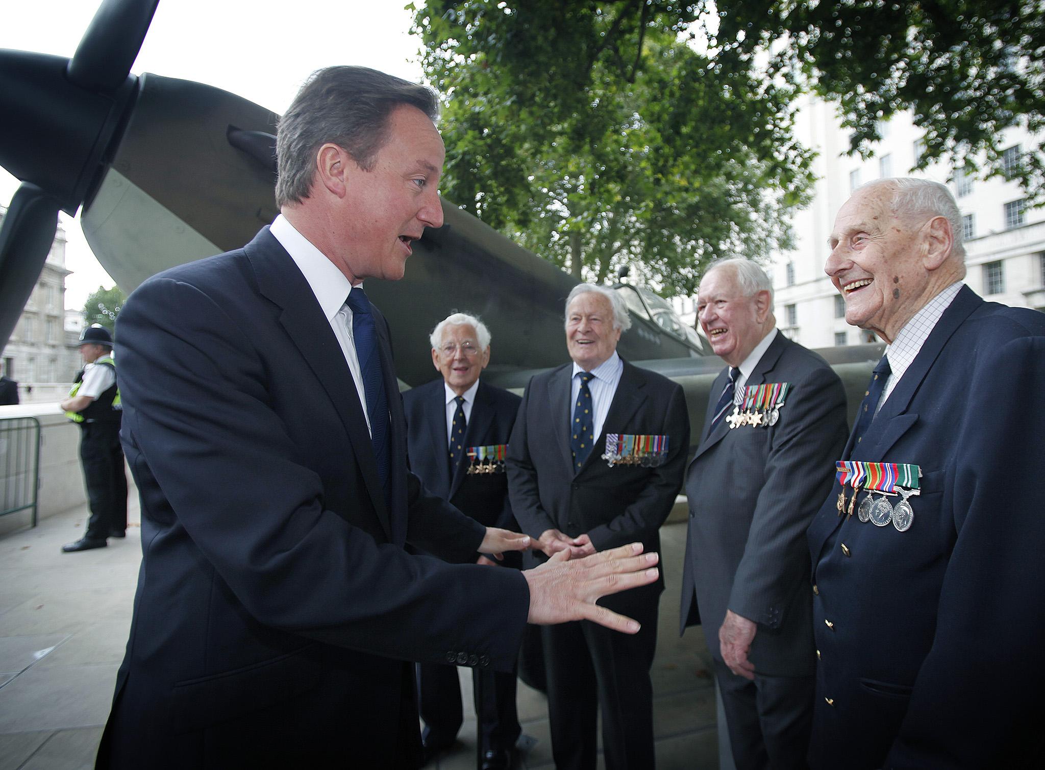 David Cameron meets war veterans during his time as prime minister of Britain