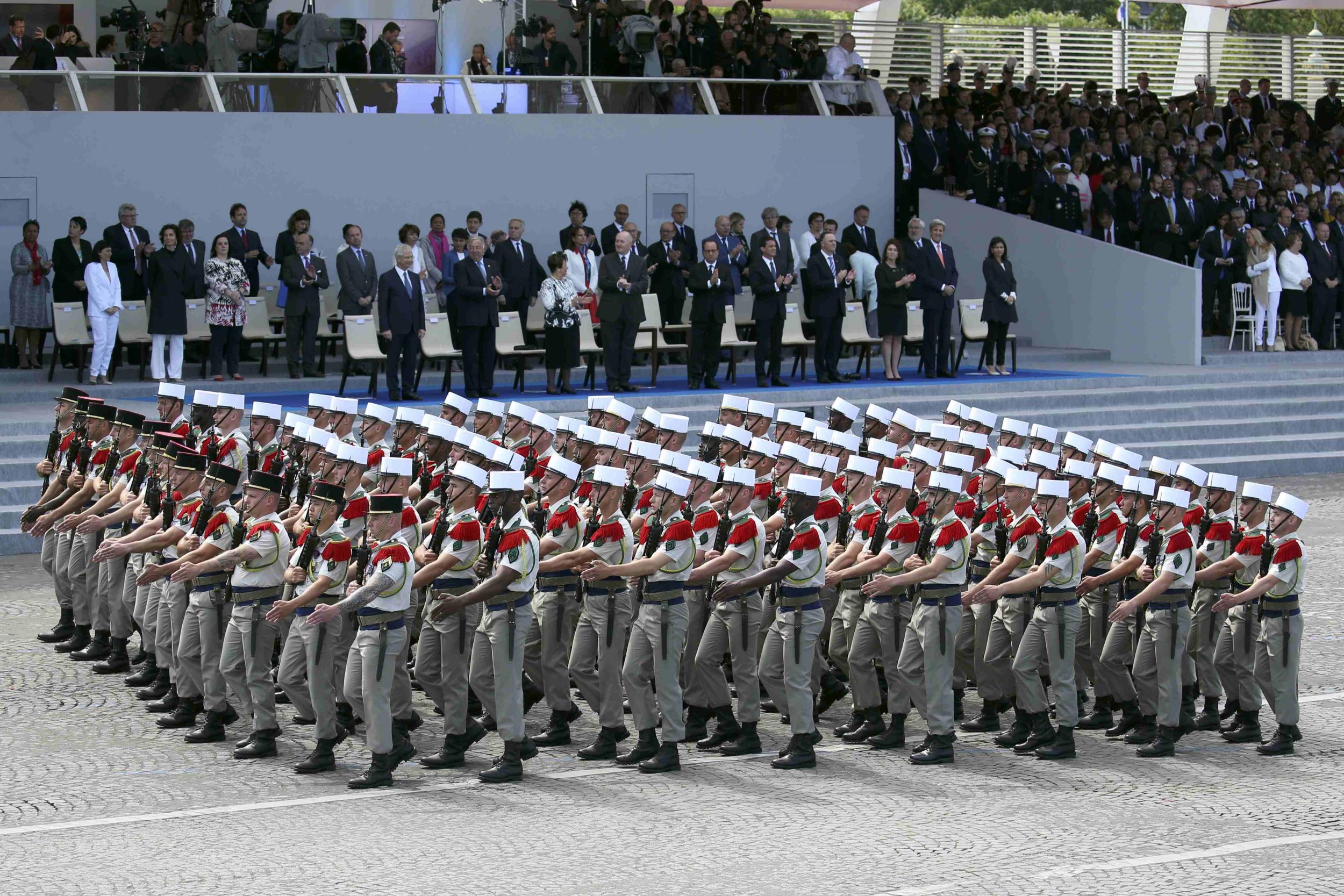 Members of the 13th Demi-Brigade of the Foreign Legion march in front of the Presidential Tribune at the Place de la Concorde during the Bastille Day military parade in Paris