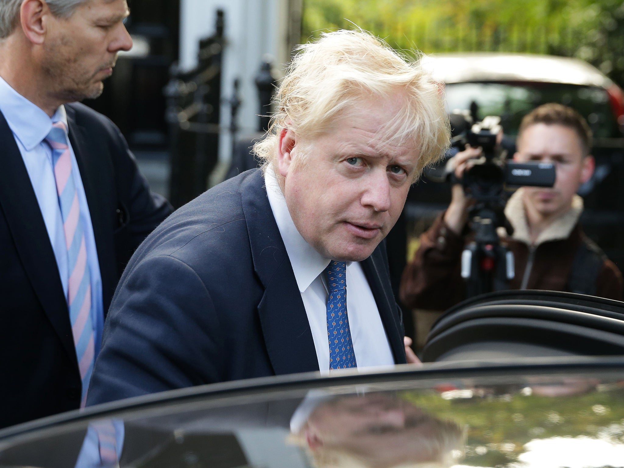 Foreign Secretary Boris Johnson leaves his home in London yesterday morning